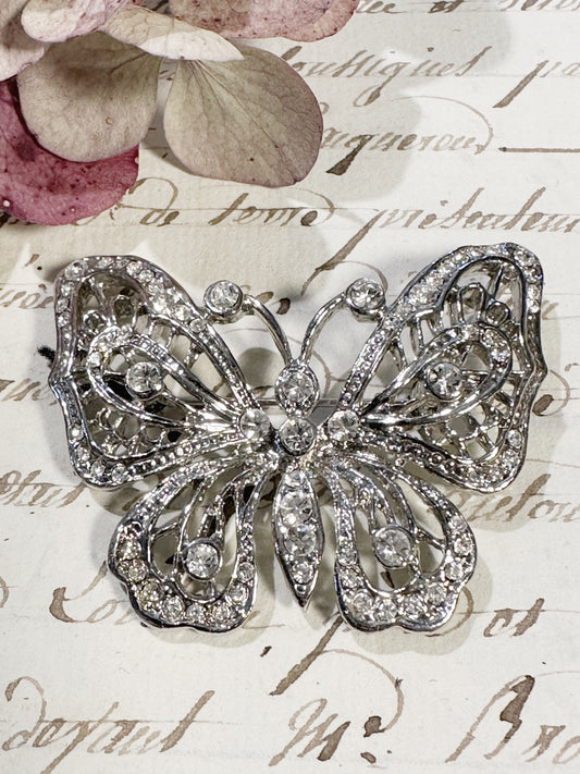 A pretty vintage diamanté butterfly brooch