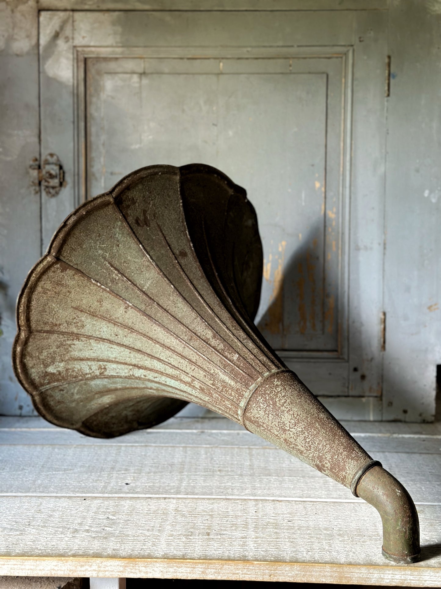 A wonderful antique French tin gramophone funnel and elbow
