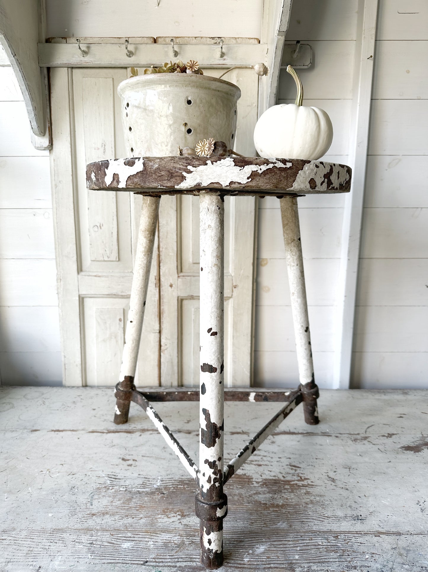 A chippy white French engineer’s stool 1930’s