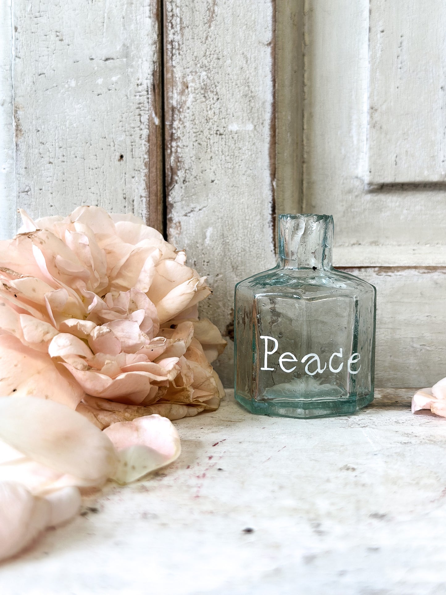 A beautiful Victorian bottle with a hand painted quote