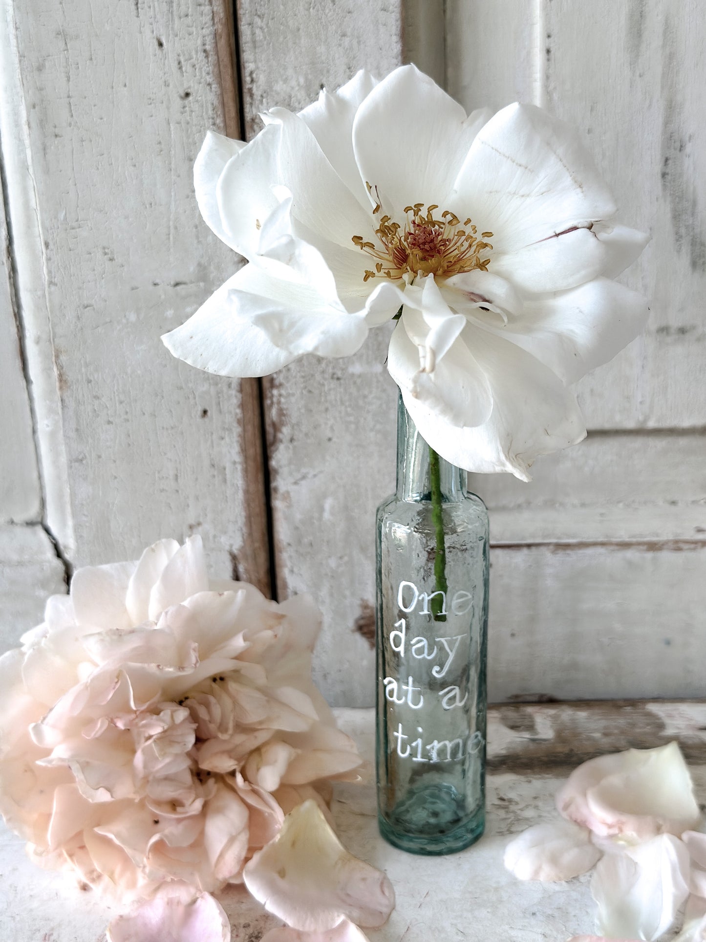 A beautiful Victorian bottle with a hand painted quote