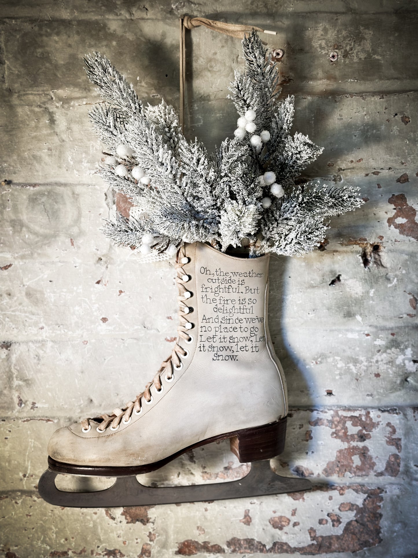 A beautiful vintage Christmas ice skate hand painted using traditional sign writer’s techniques and materials