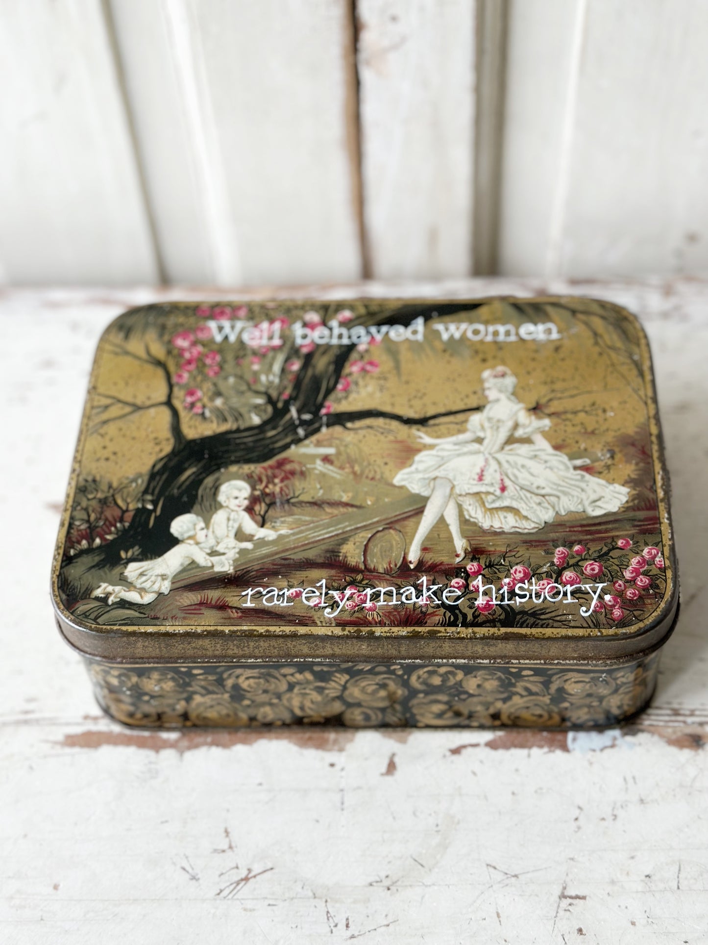 A pretty antique tin with a hand painted quote.