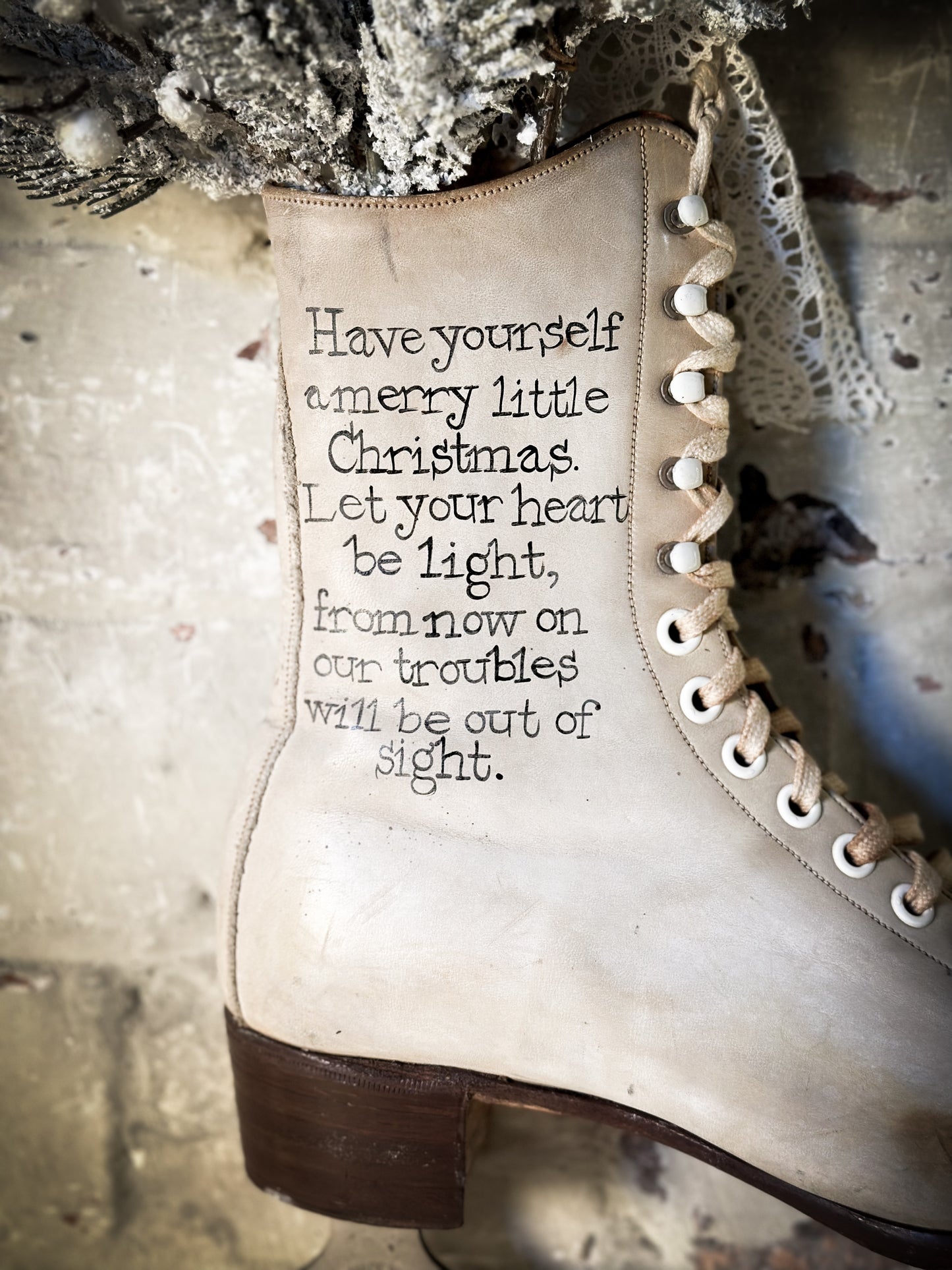 A beautiful vintage Christmas ice skate hand painted using traditional sign writer’s techniques and materials