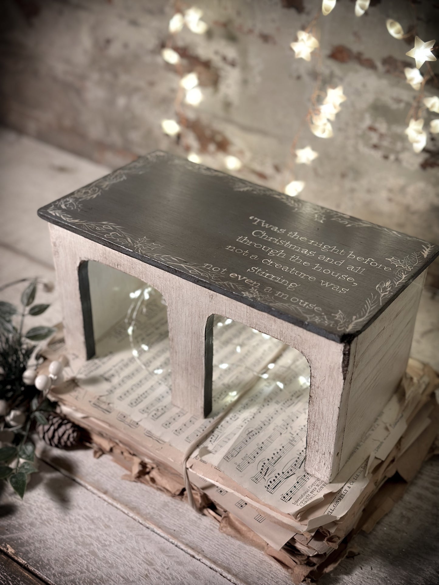 A hand painted quote on a vintage scratch built folk art model farm barn