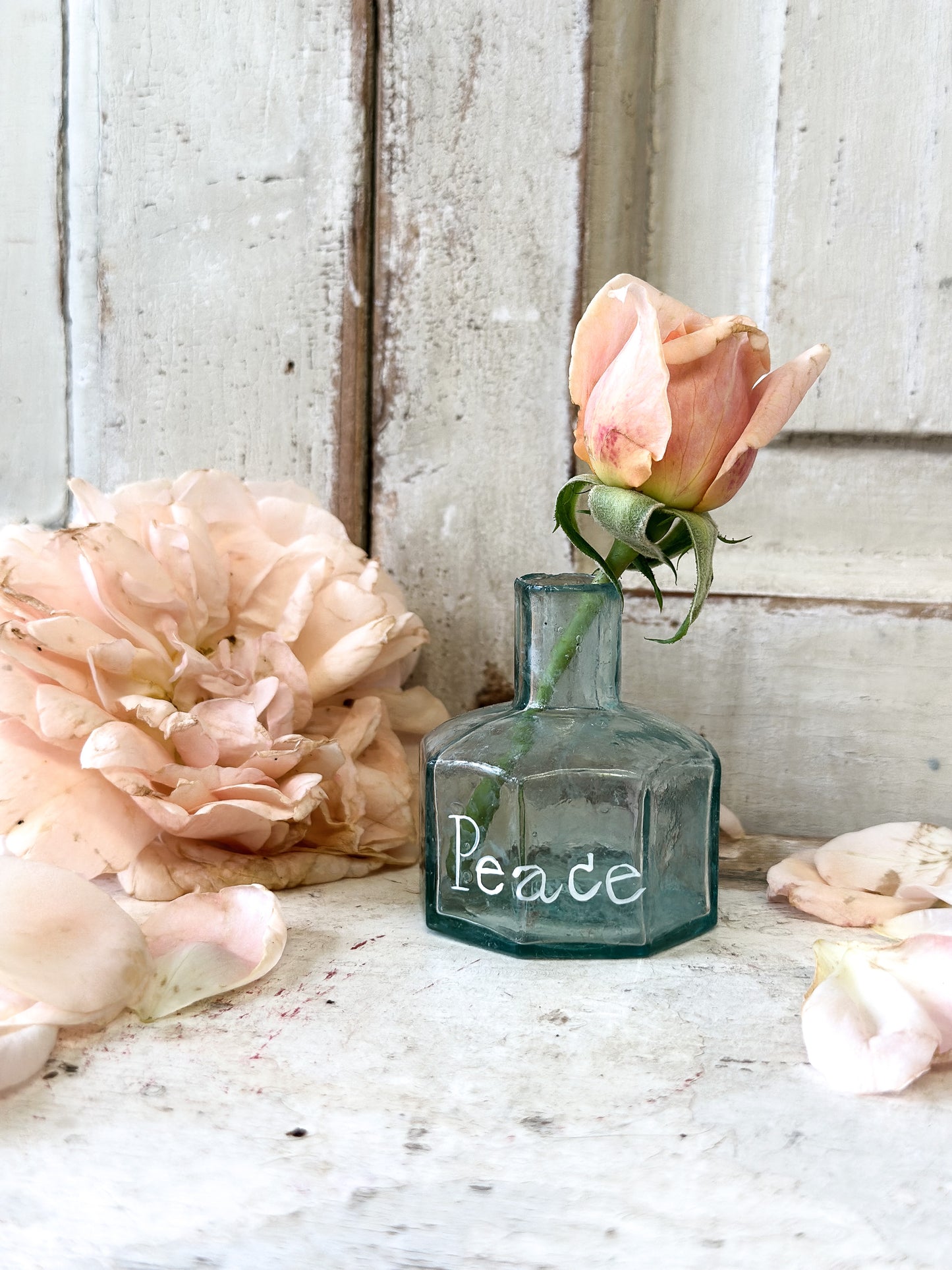 A beautiful Victorian bottle with a hand painted quote