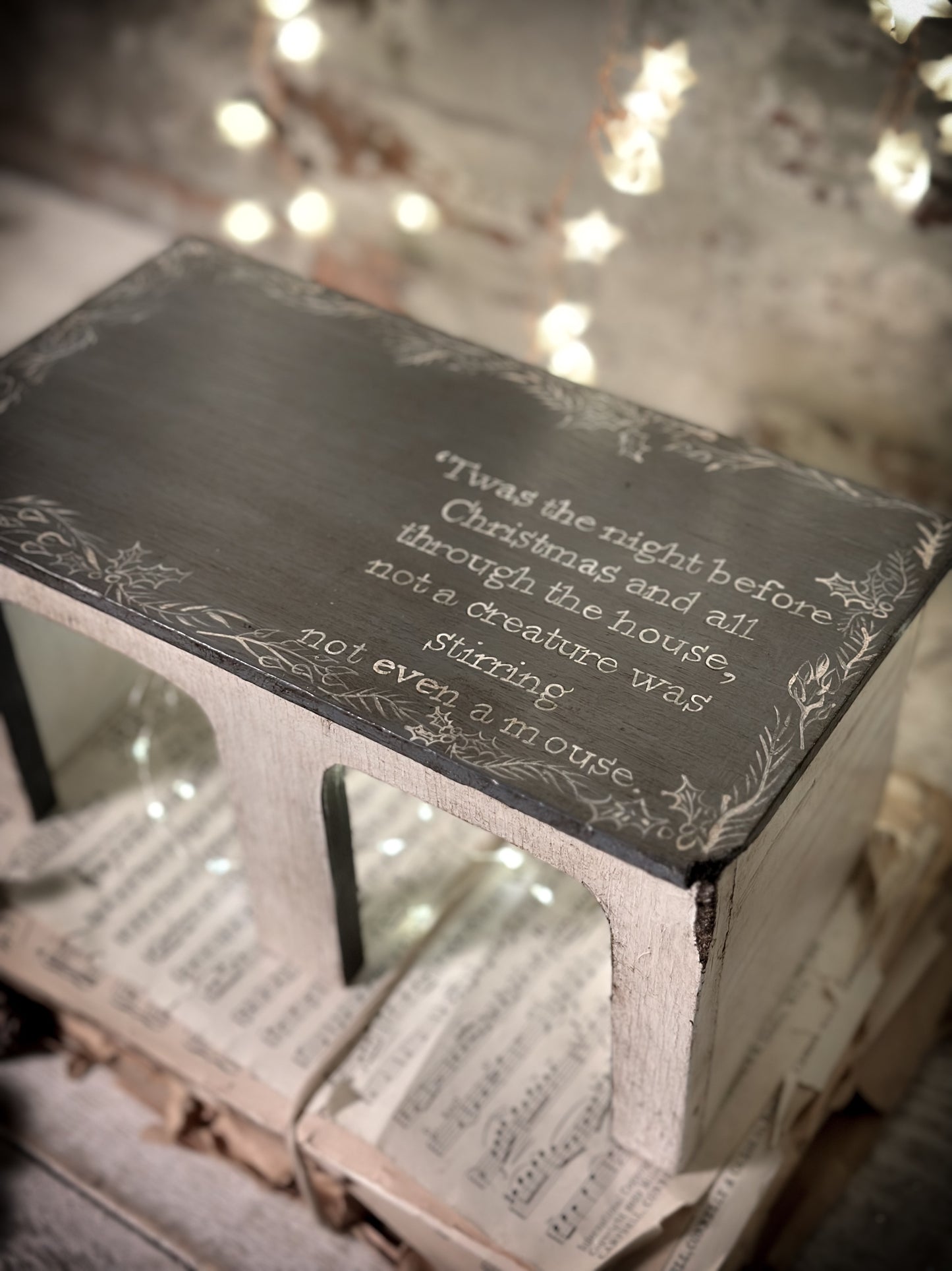 A hand painted quote on a vintage scratch built folk art model farm barn
