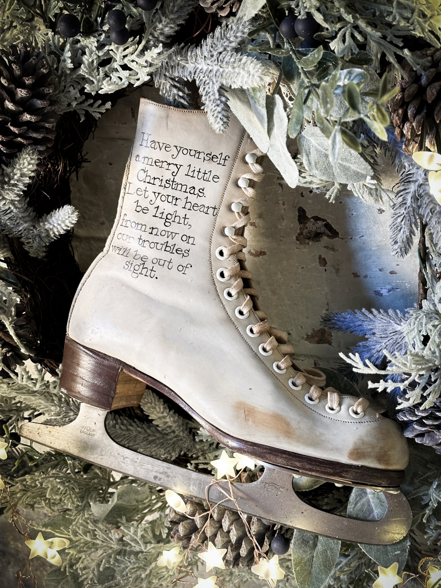 A beautiful vintage Christmas ice skate hand painted using traditional sign writer’s techniques and materials