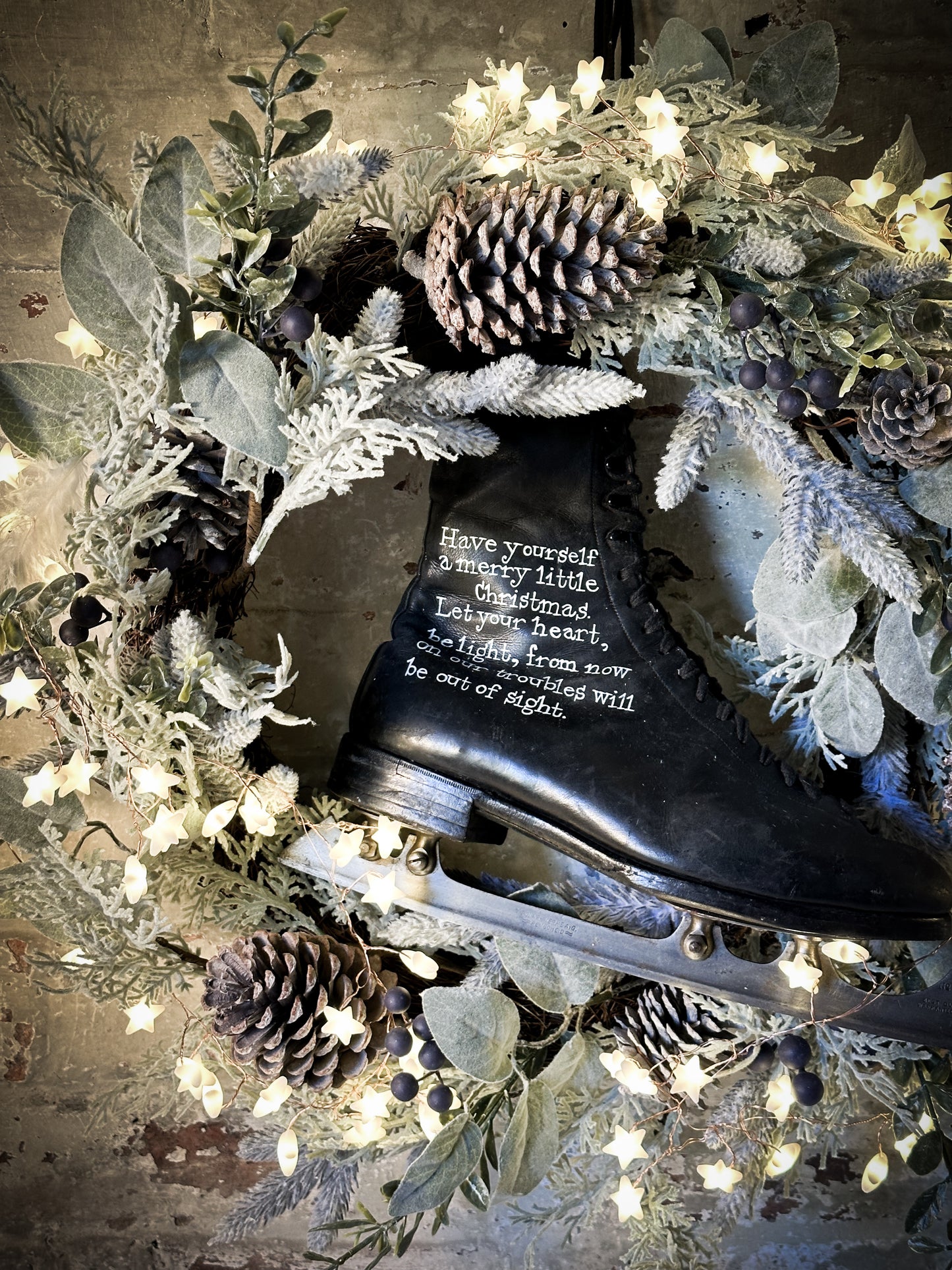 A beautiful vintage Christmas ice skate hand painted using traditional sign writer’s techniques and materials
