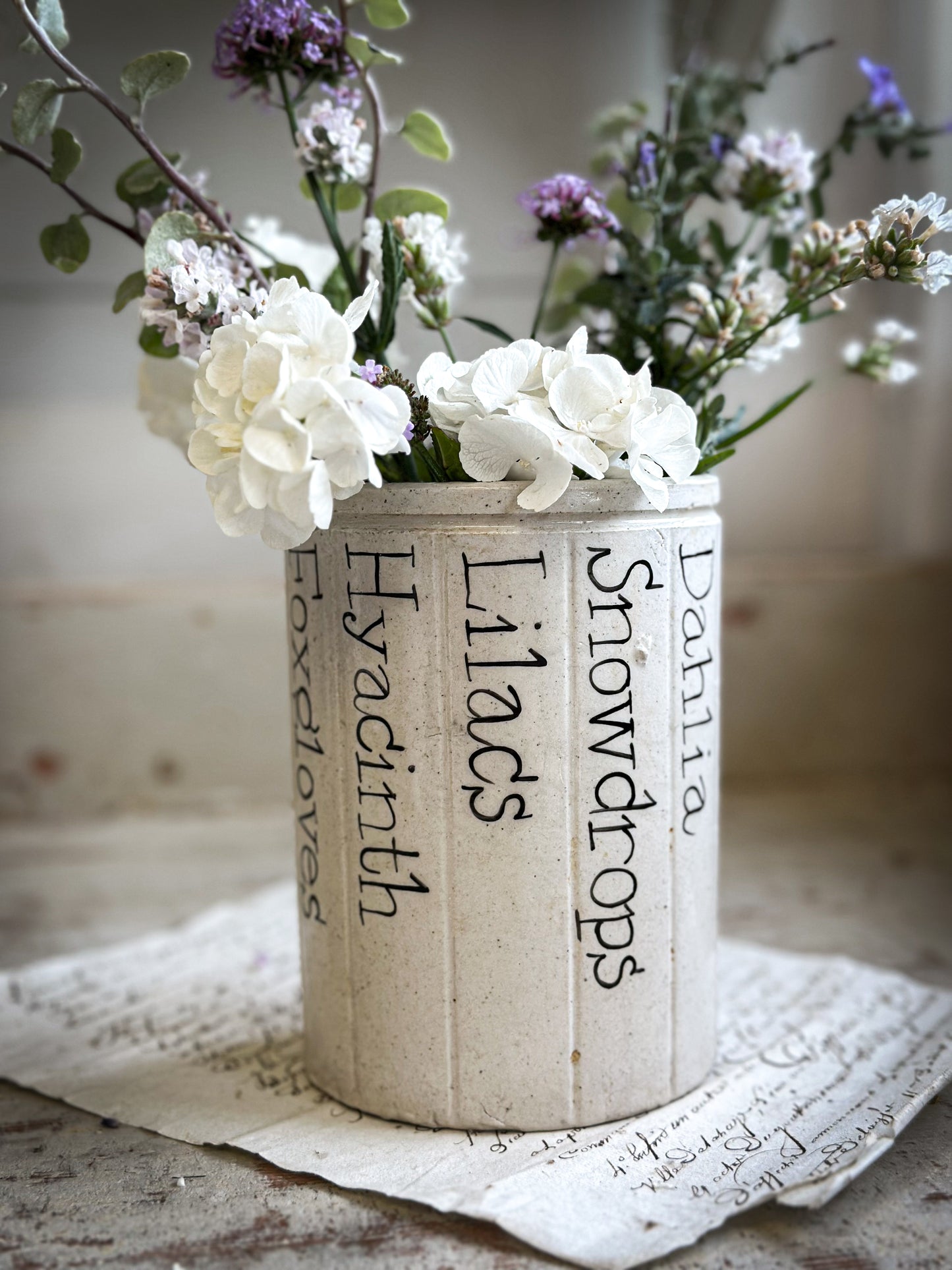 A Victorian Stoneware Preserve jar with hand painted botanical names pot
