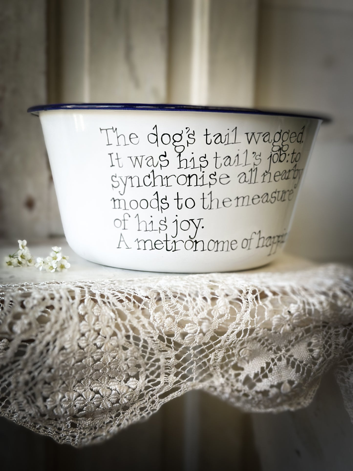 A beautiful vintage enamel pudding bowl with a hand painted quote