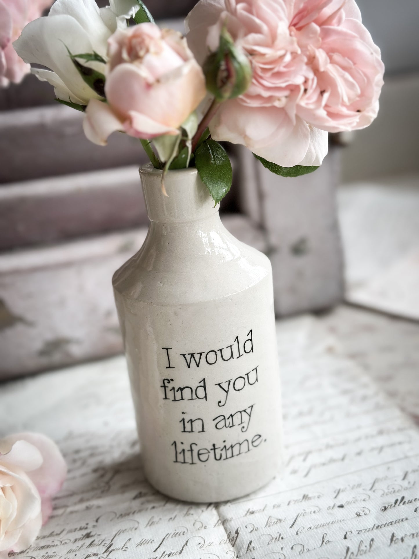 A Victorian unearthed stoneware pottery bottle with a hand painted quote