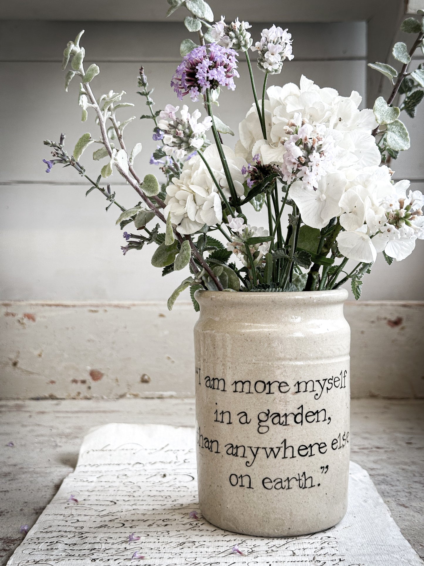 A Victorian unearthed short stoneware pottery jar with a hand painted quote