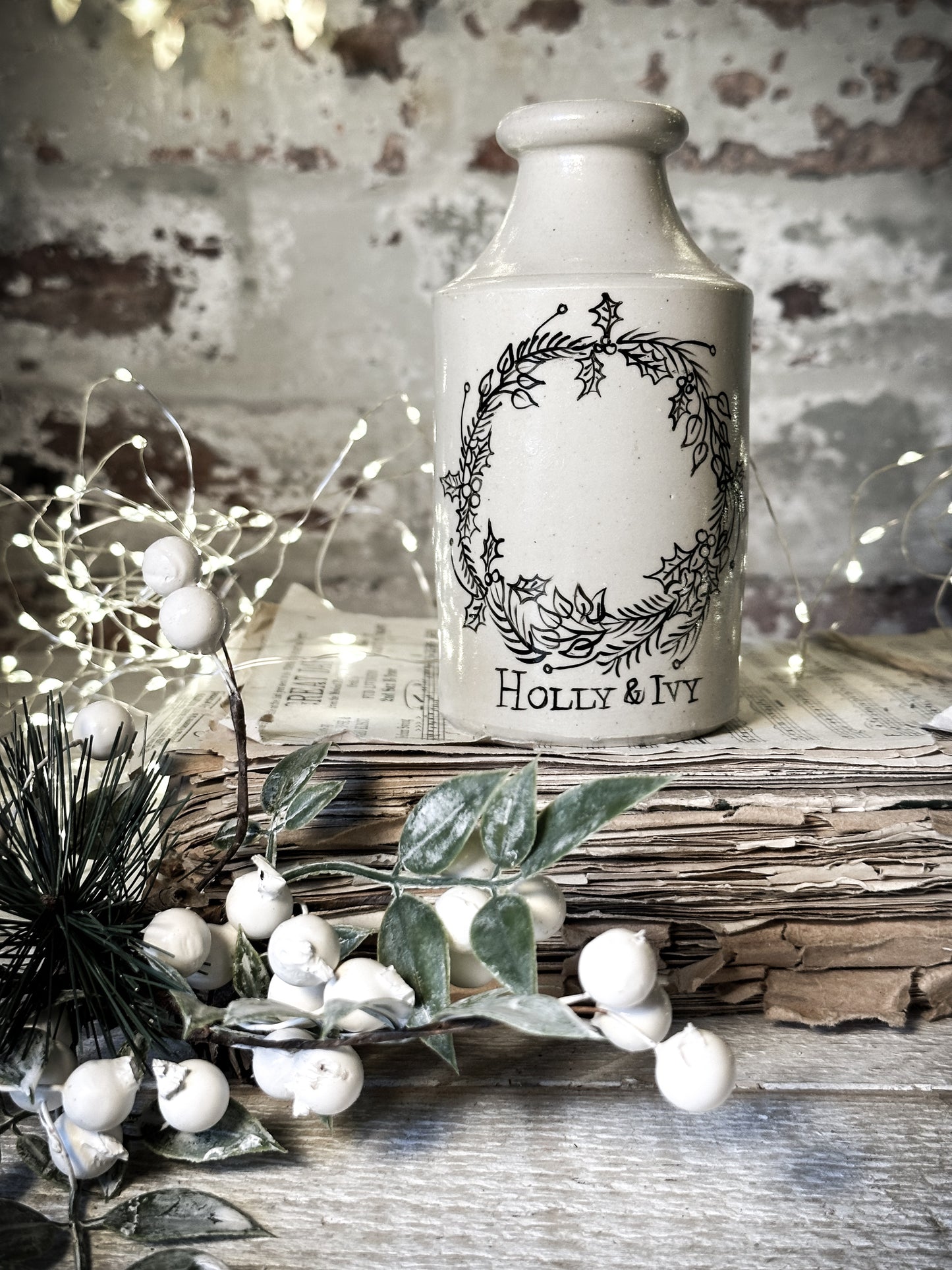 A hand painted and illustrated vintage Victorian bottle