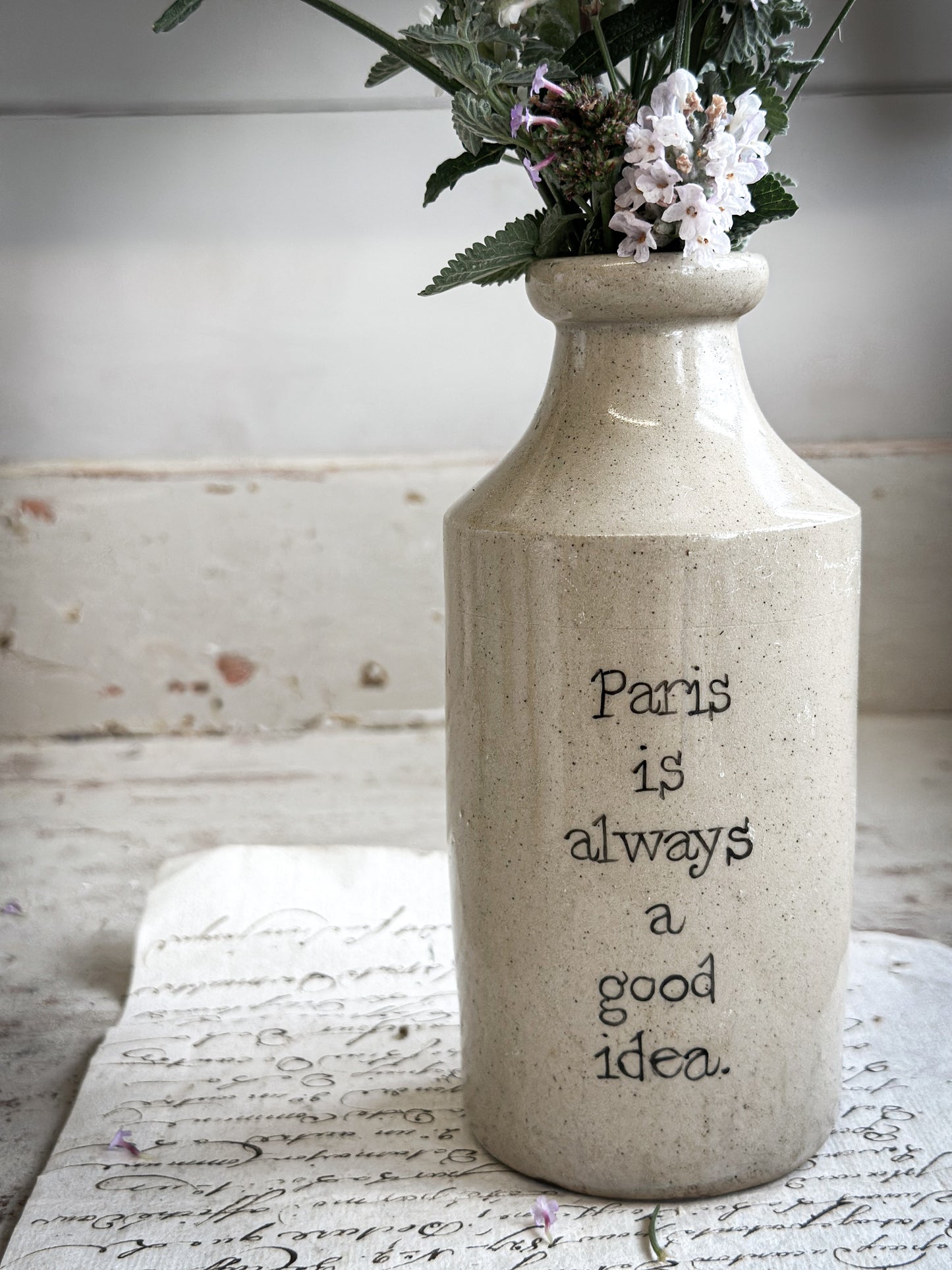 A Victorian unearthed short stoneware pottery bottle with a hand painted quote