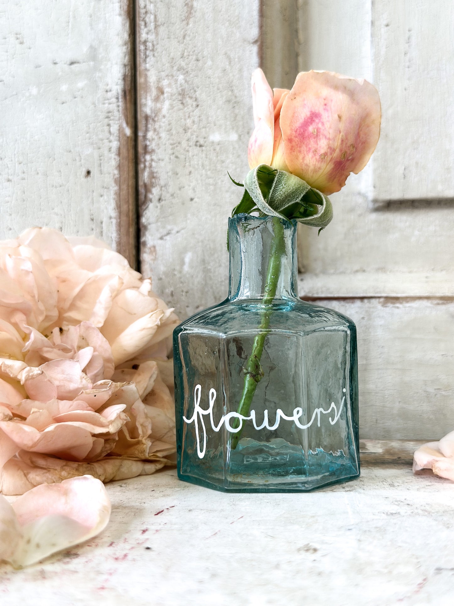 A beautiful Victorian bottle with a hand painted quote