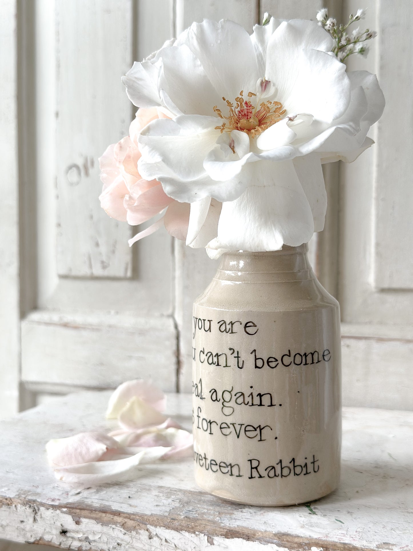 A Victorian unearthed stoneware pottery bottle with a hand painted quote