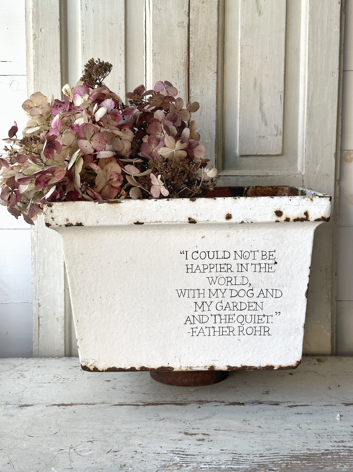 A stunning large antique cast iron Victorian Rain hopper planter