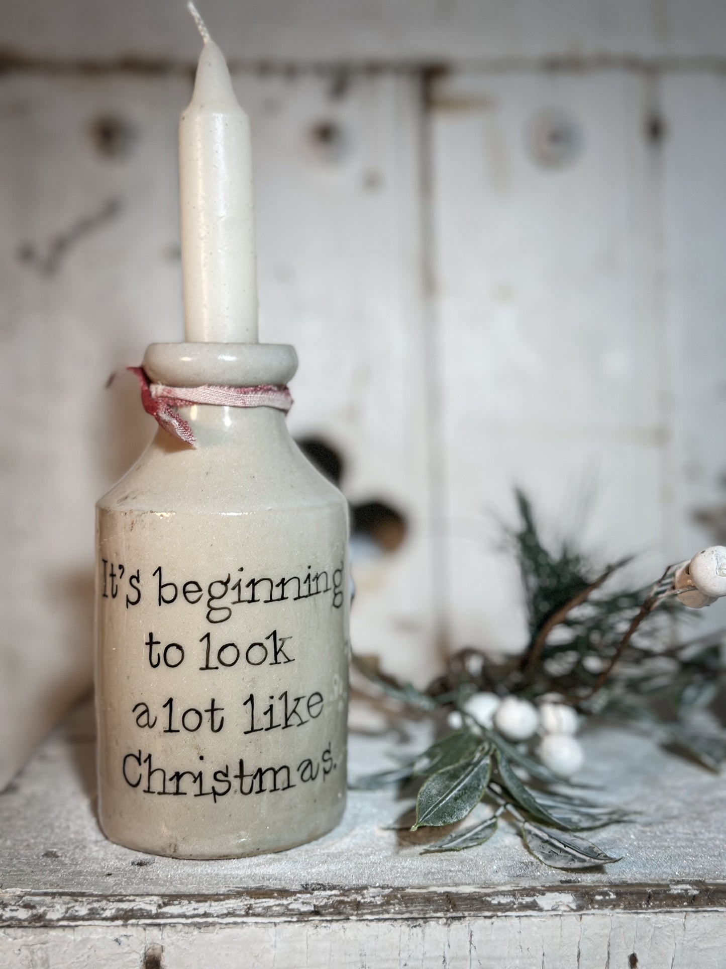 A Victorian unearthed stoneware pottery tall bottle with a hand painted quote