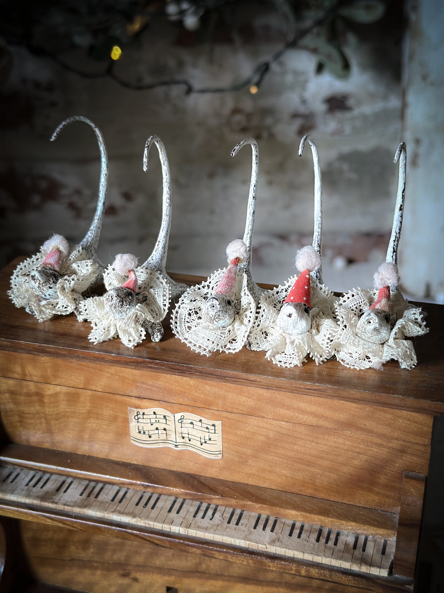 A cold painted brass “night before Christmas mouse” with a lace ruffle and Christmas hat