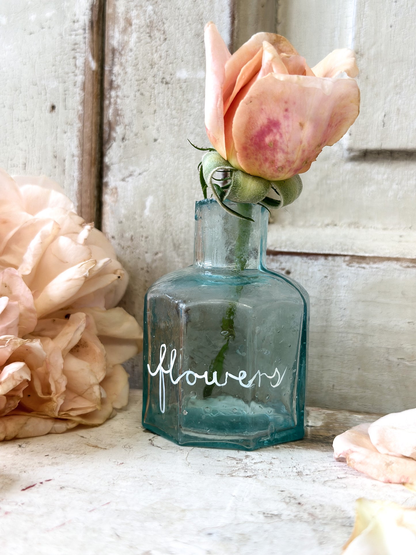 A beautiful Victorian bottle with a hand painted quote