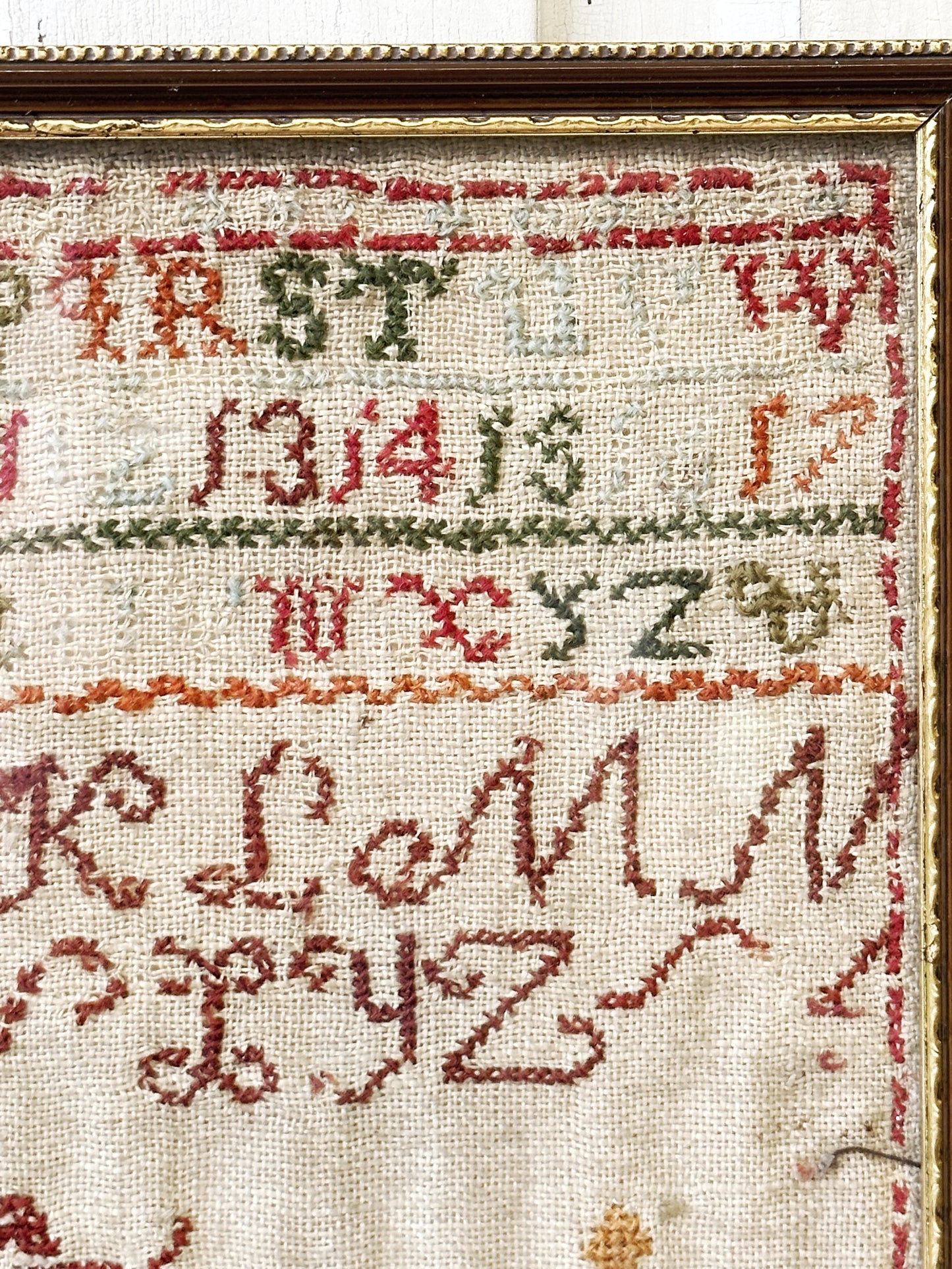 A beautiful 19th century colourful antique needlework sampler