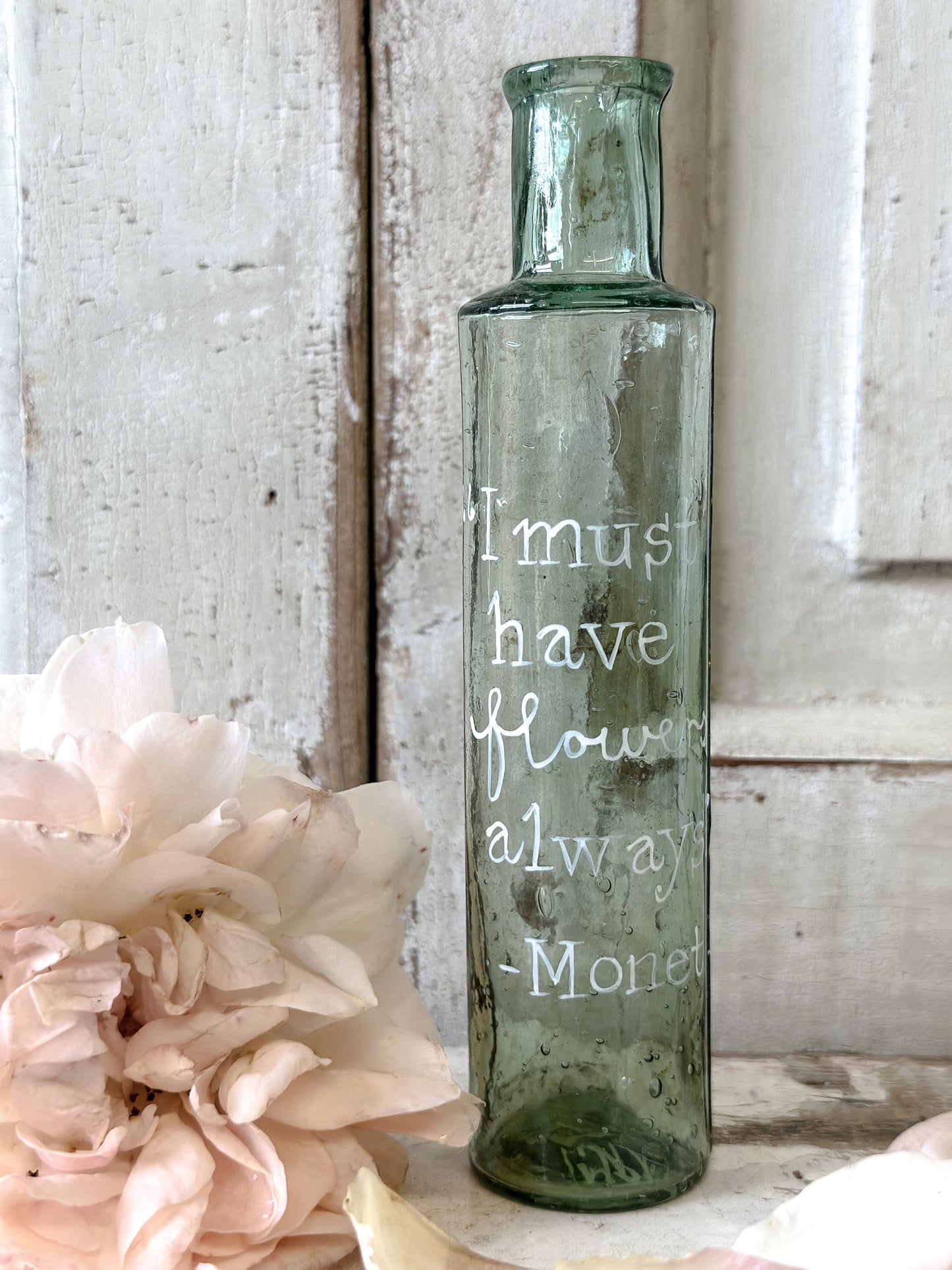 A beautiful Victorian bottle with a hand painted quote