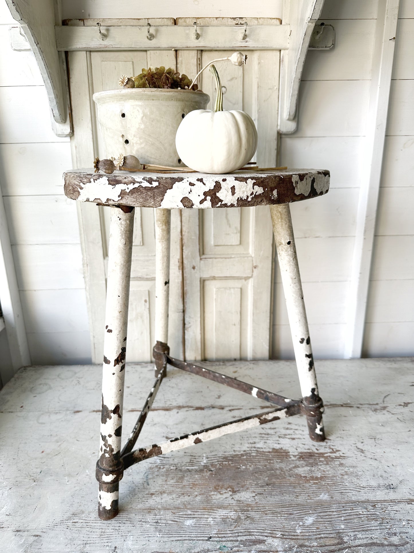 A chippy white French engineer’s stool 1930’s