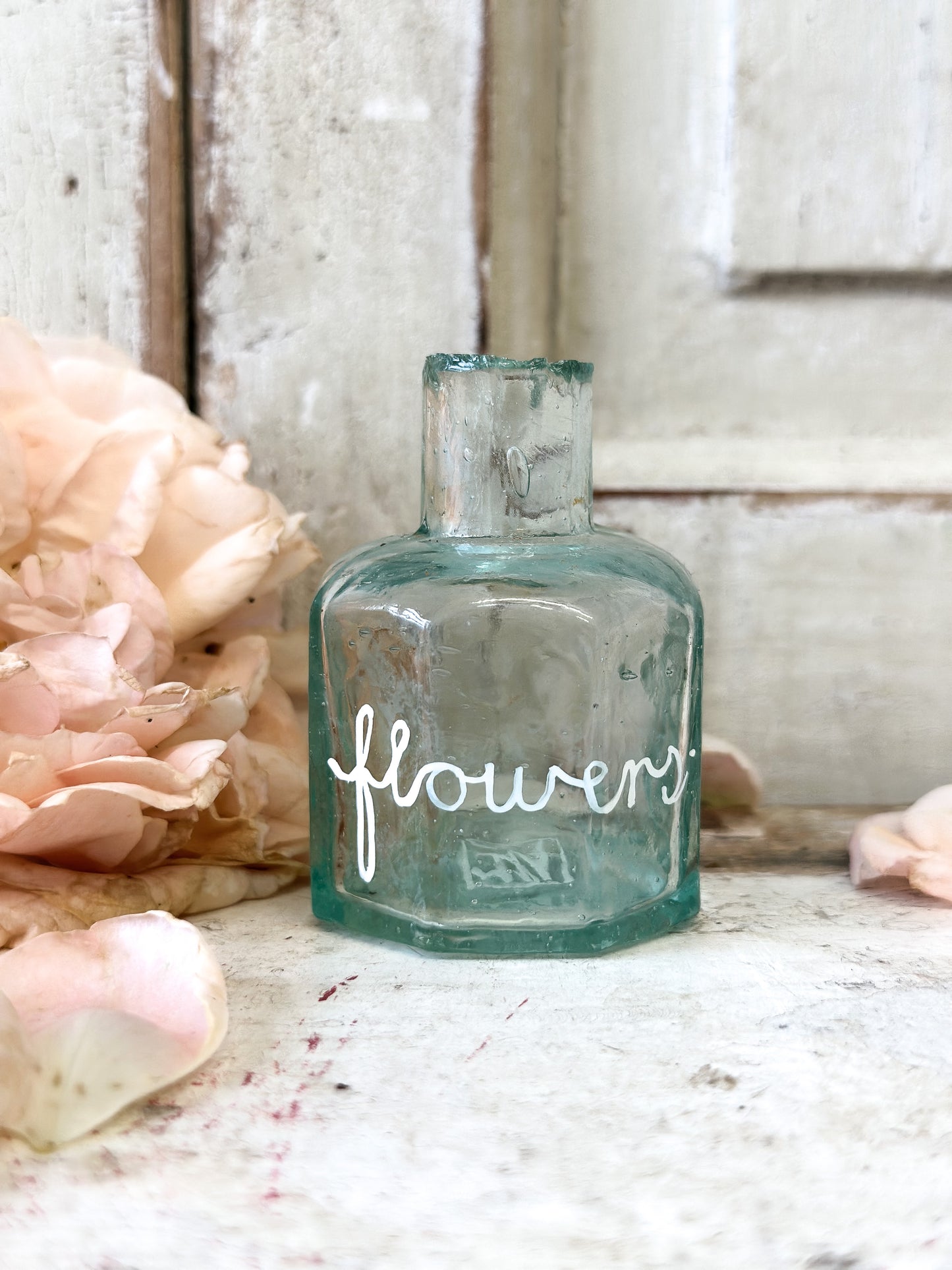 A beautiful Victorian bottle with a hand painted quote