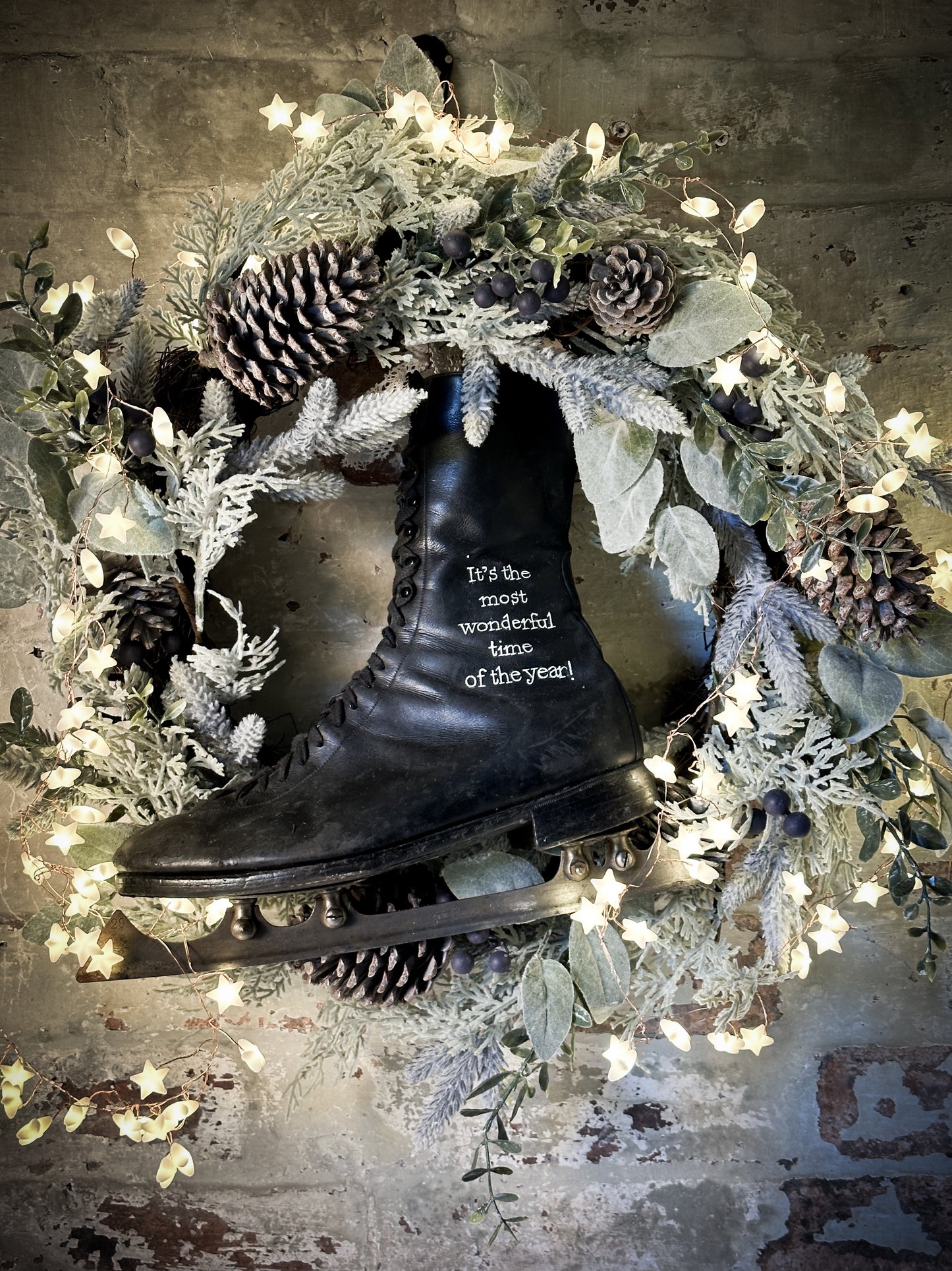 A beautiful vintage Christmas ice skate hand painted using traditional sign writer’s techniques and materials