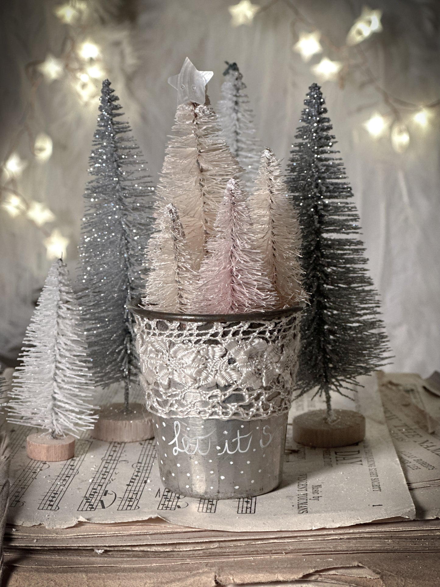 A hand painted vintage Dariole tin with lace trimming and a Christmas quote