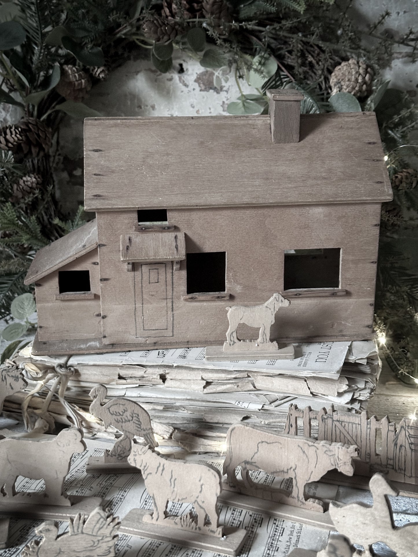 Antique scratch built farmhouse with animals and farmer and wife
