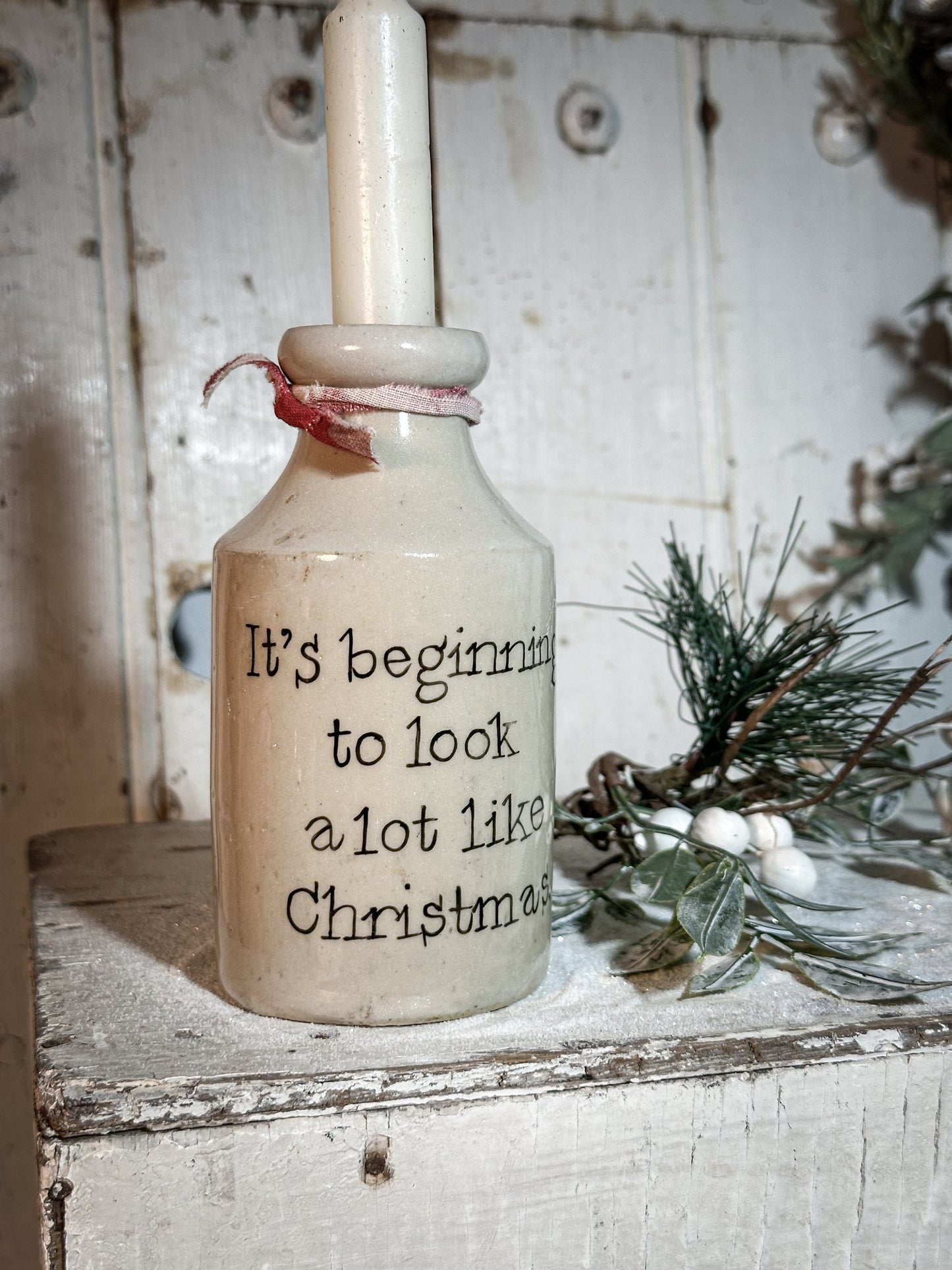 A Victorian unearthed stoneware pottery tall bottle with a hand painted quote