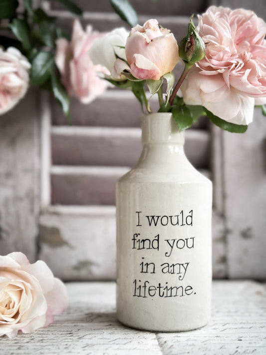 A Victorian unearthed stoneware pottery bottle with a hand painted quote