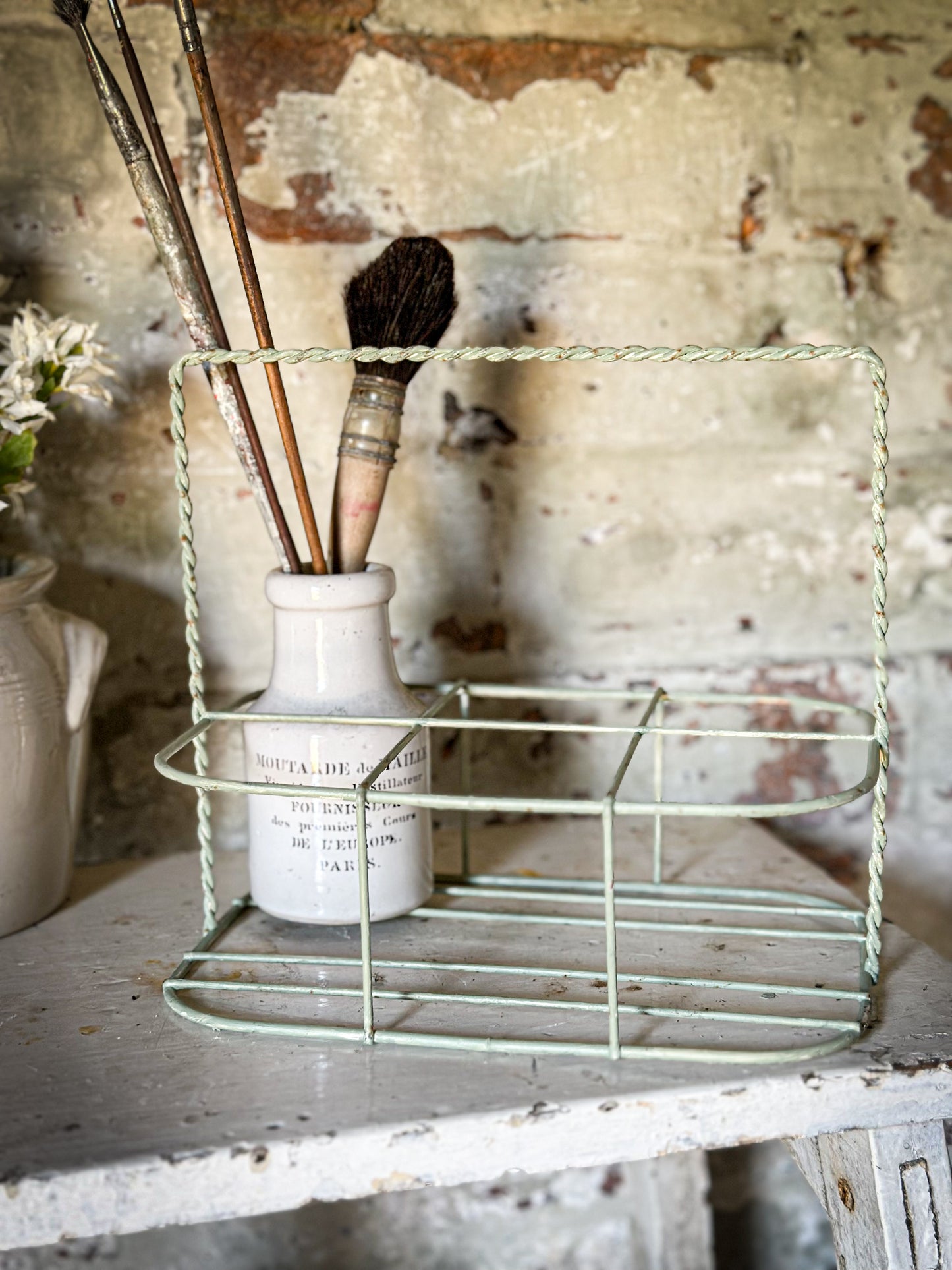 A Vintage French Wire Bottle Rack