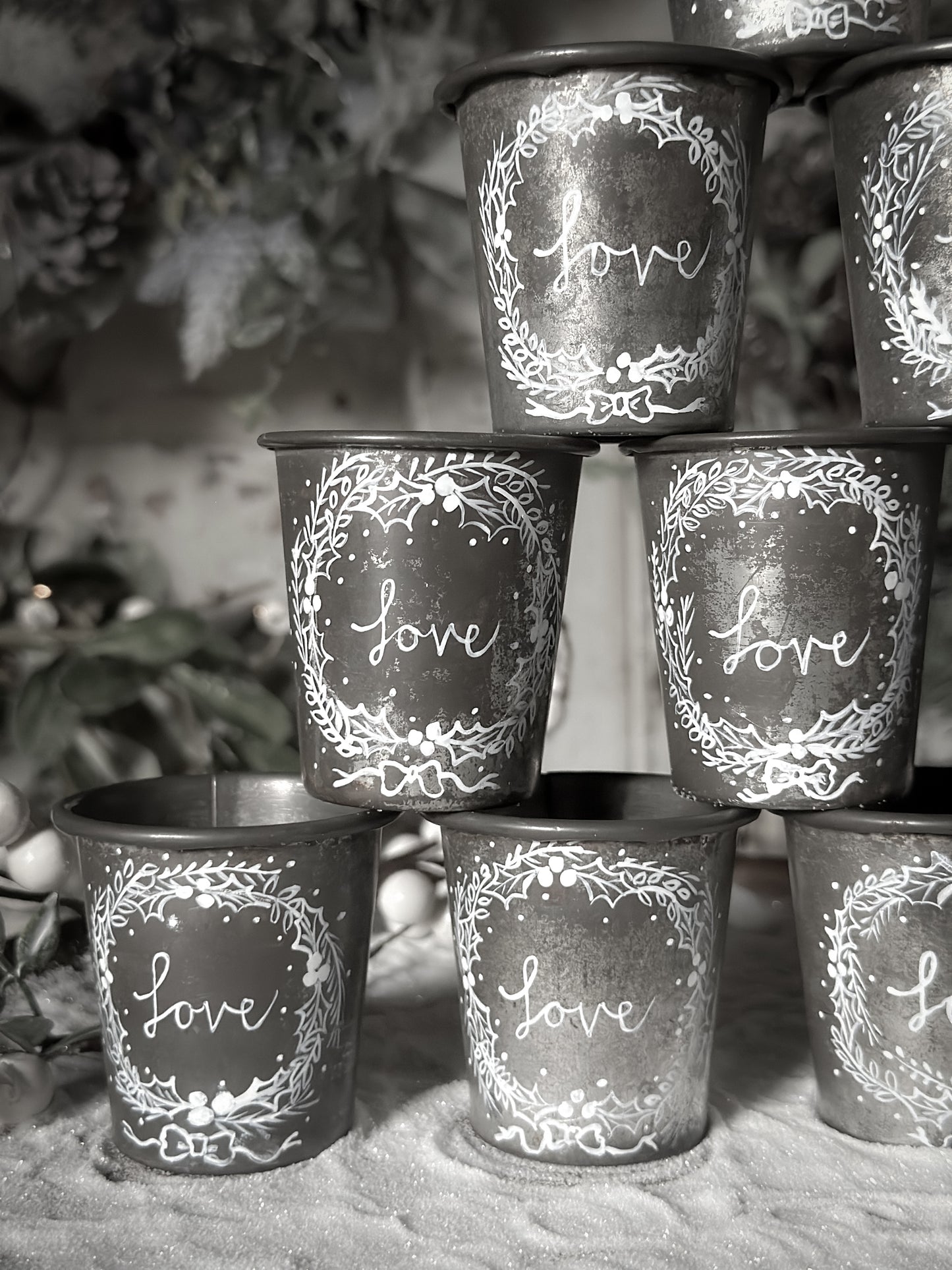 A pretty hand painted Dariole tin tea light holder