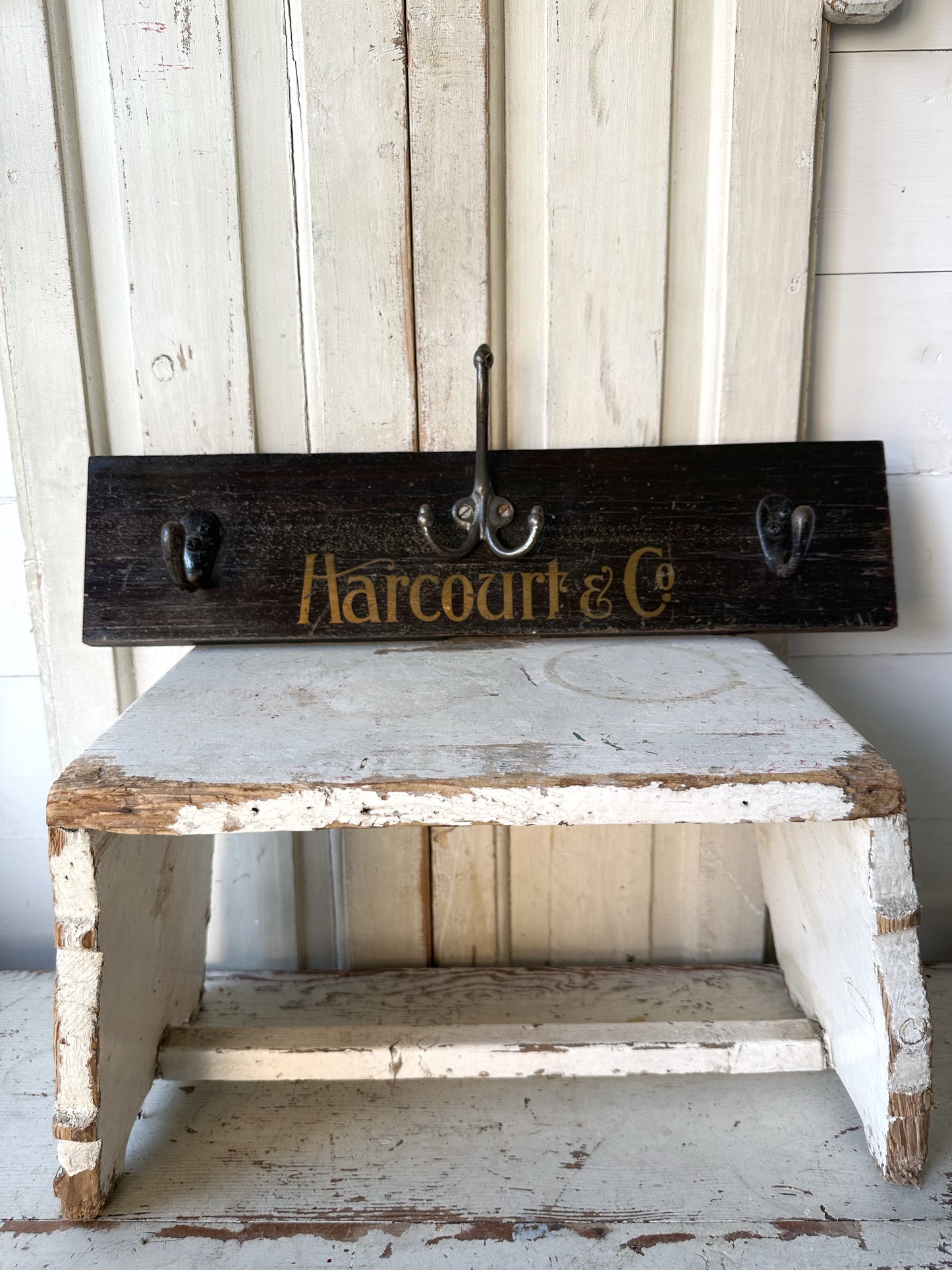 Salvaged sign written drawer front coat pegs
