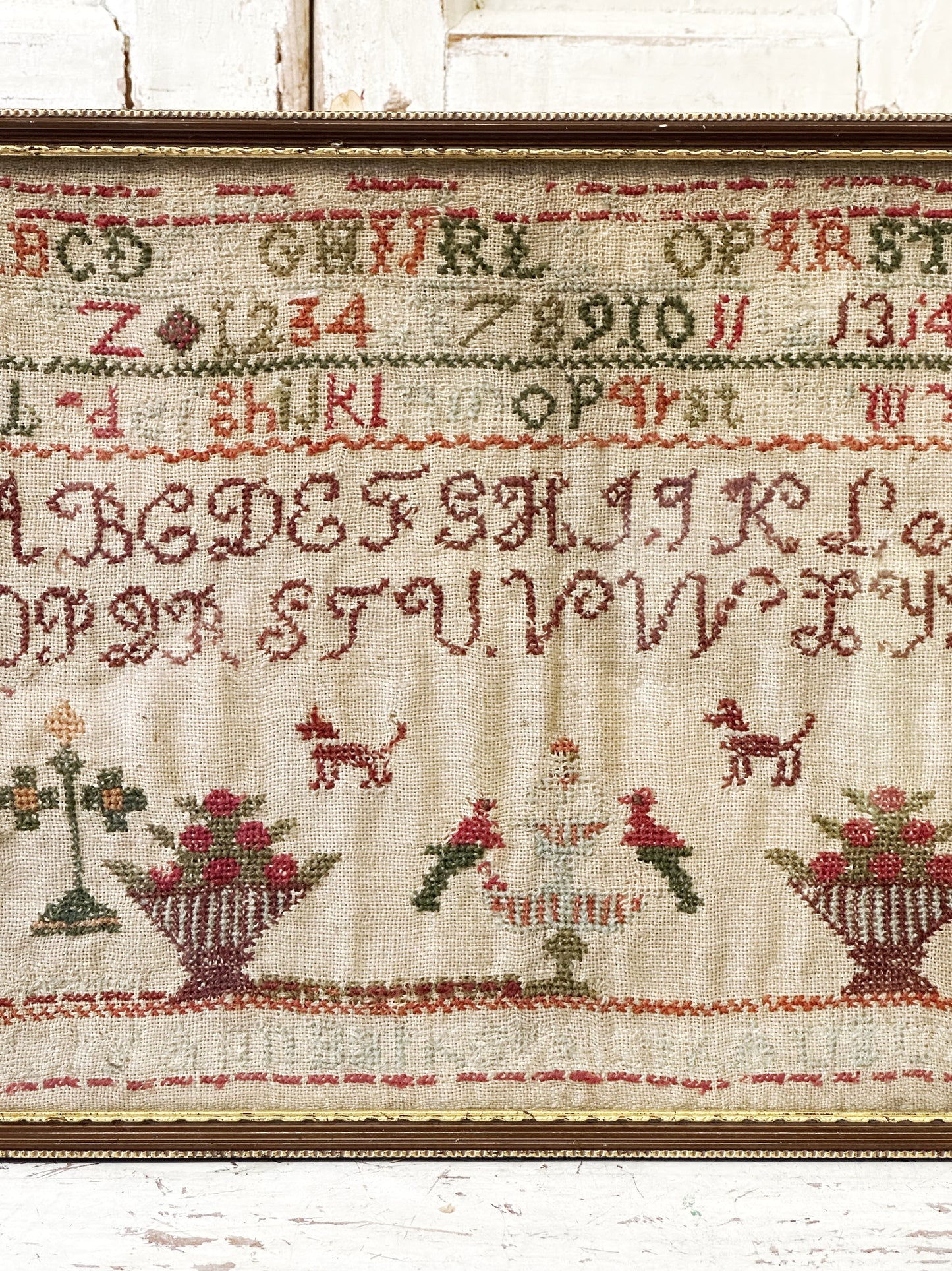 A beautiful 19th century colourful antique needlework sampler