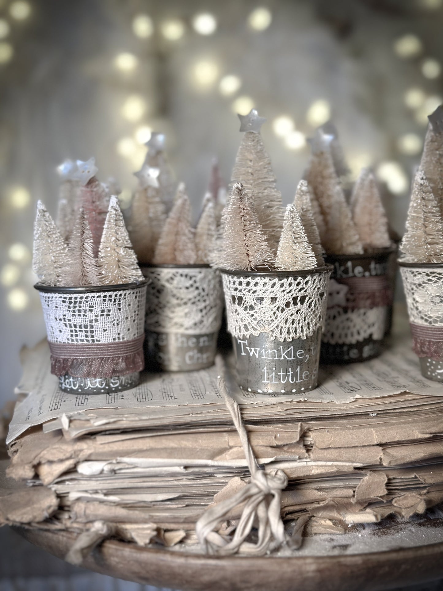A hand painted vintage Dariole tin with lace trimming and a Christmas quote