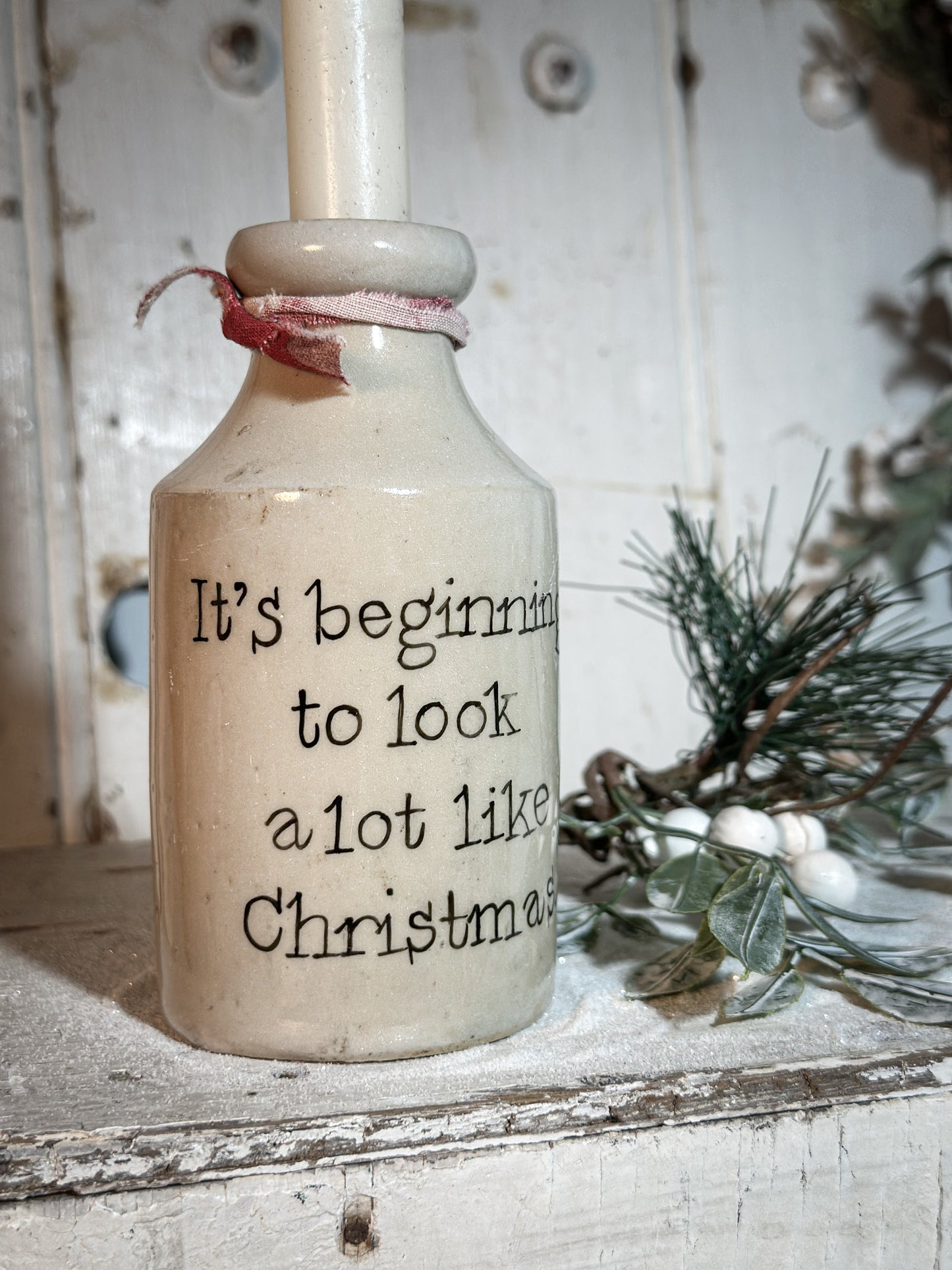 A Victorian unearthed stoneware pottery tall bottle with a hand painted quote