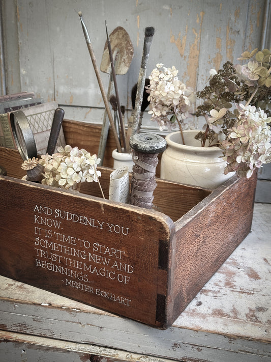 A Vintage Wooden Drawer With Hand Painted Quote