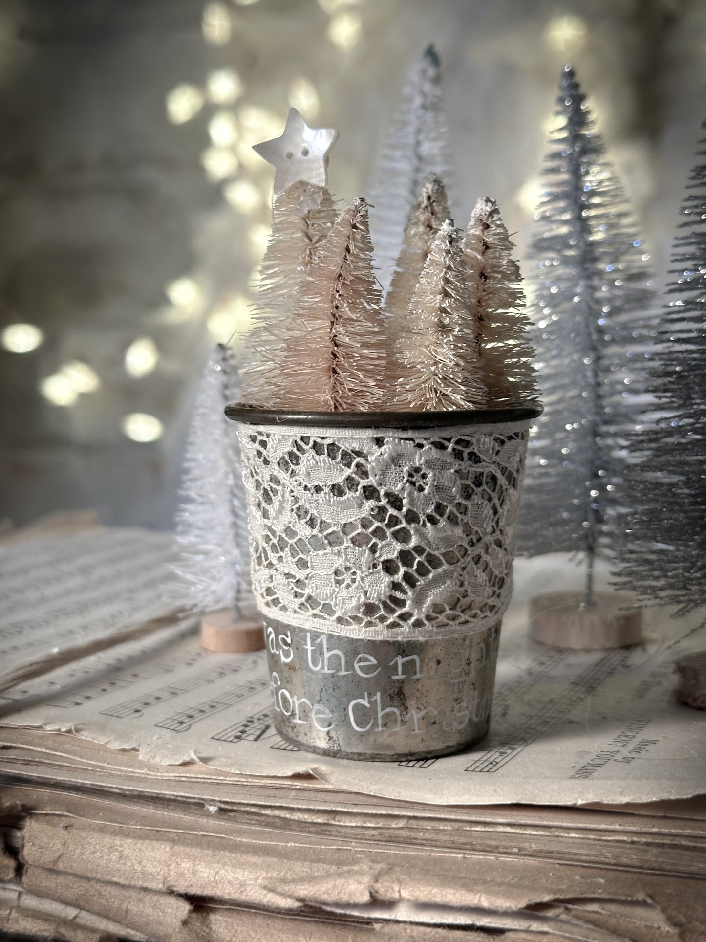 A hand painted vintage Dariole tin with lace trimming and a Christmas quote