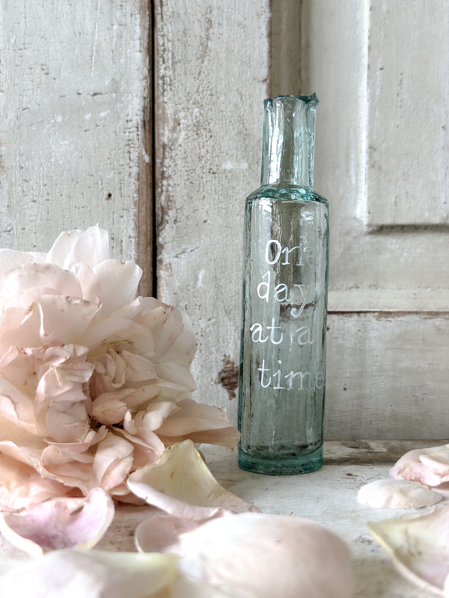 A beautiful Victorian bottle with a hand painted quote