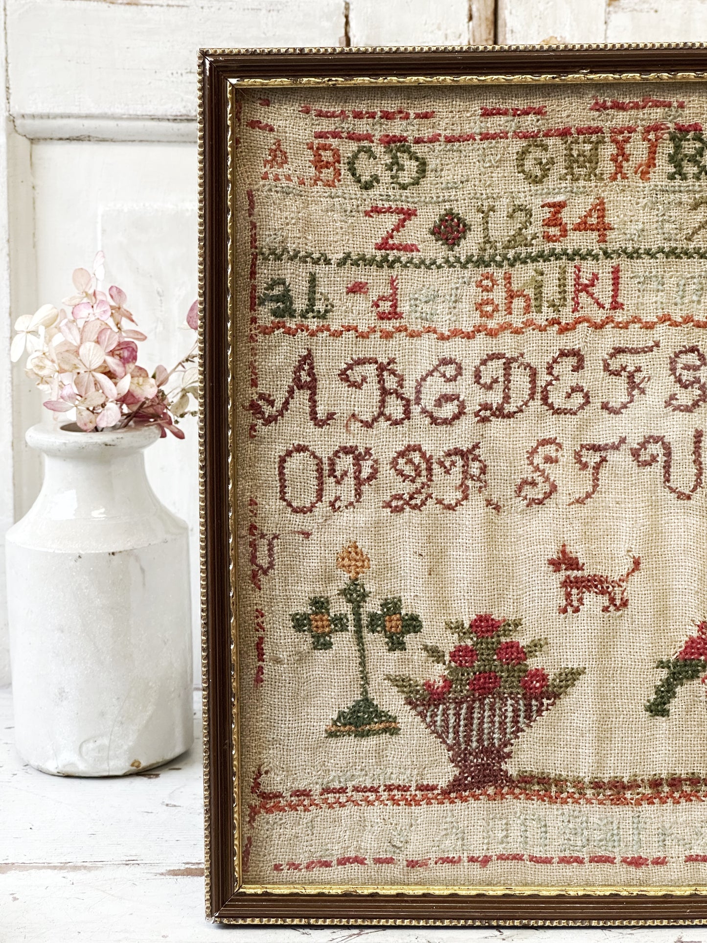 A beautiful 19th century colourful antique needlework sampler