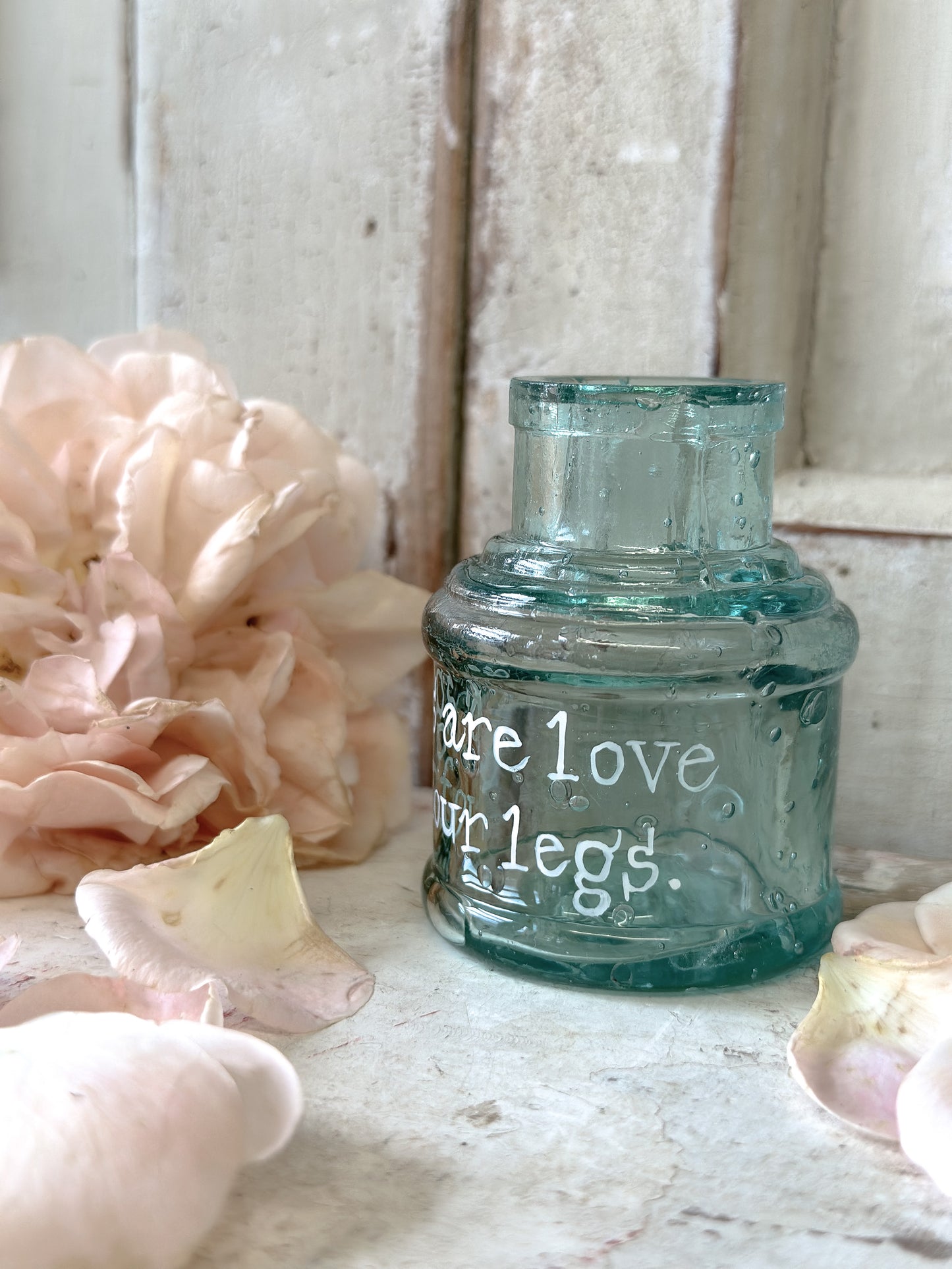 A beautiful Victorian bottle with a hand painted quote