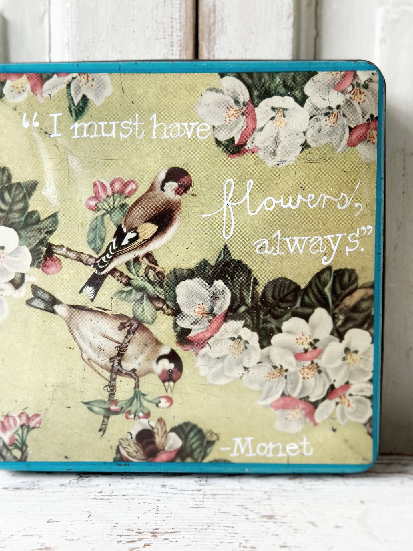 A pretty antique tin with a hand painted quote.