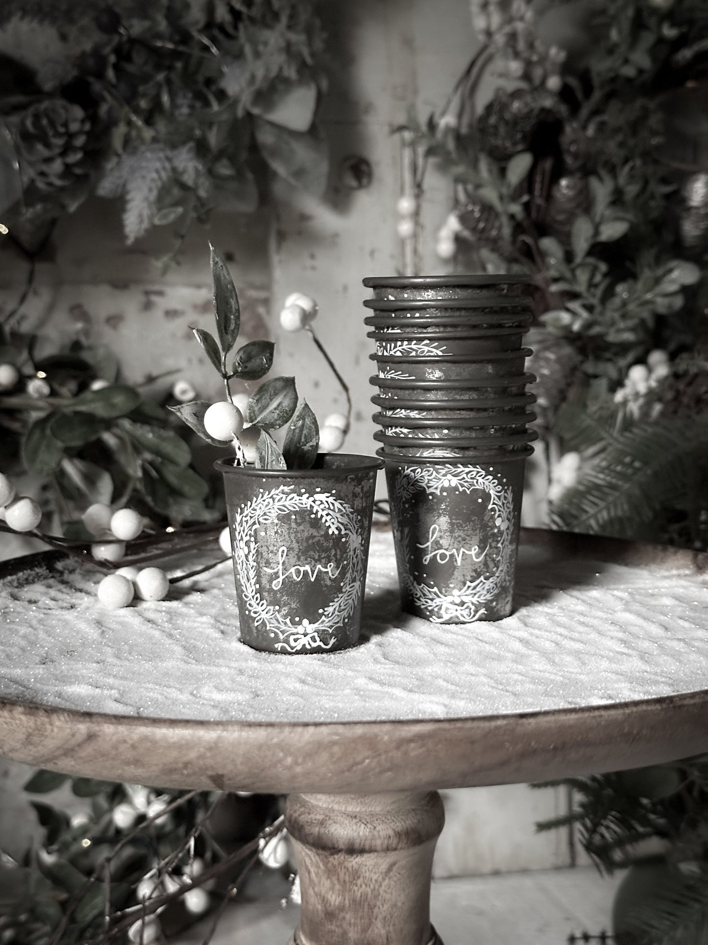 A pretty hand painted Dariole tin tea light holder