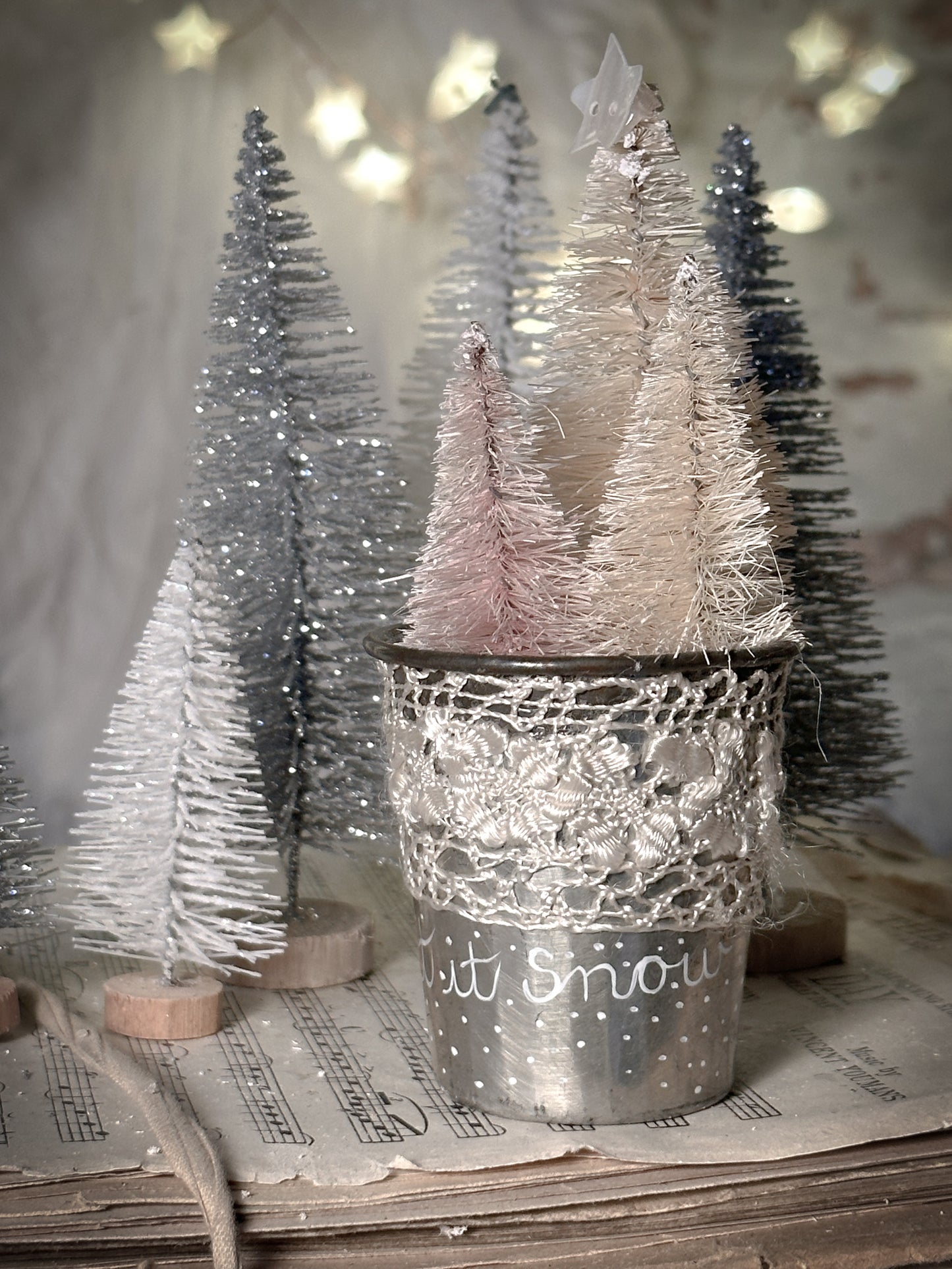 A hand painted vintage Dariole tin with lace trimming and a Christmas quote