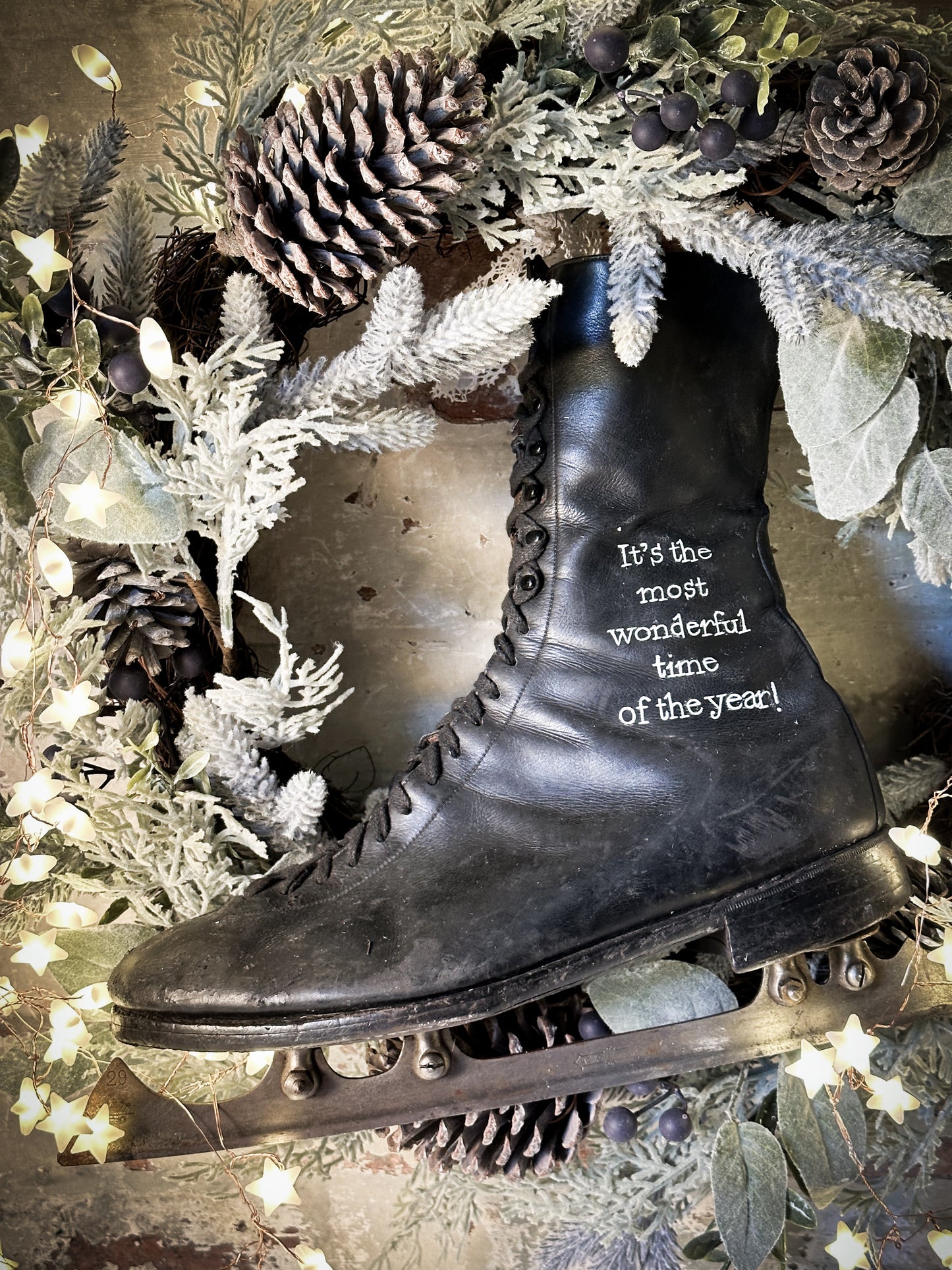 A beautiful vintage Christmas ice skate hand painted using traditional sign writer’s techniques and materials