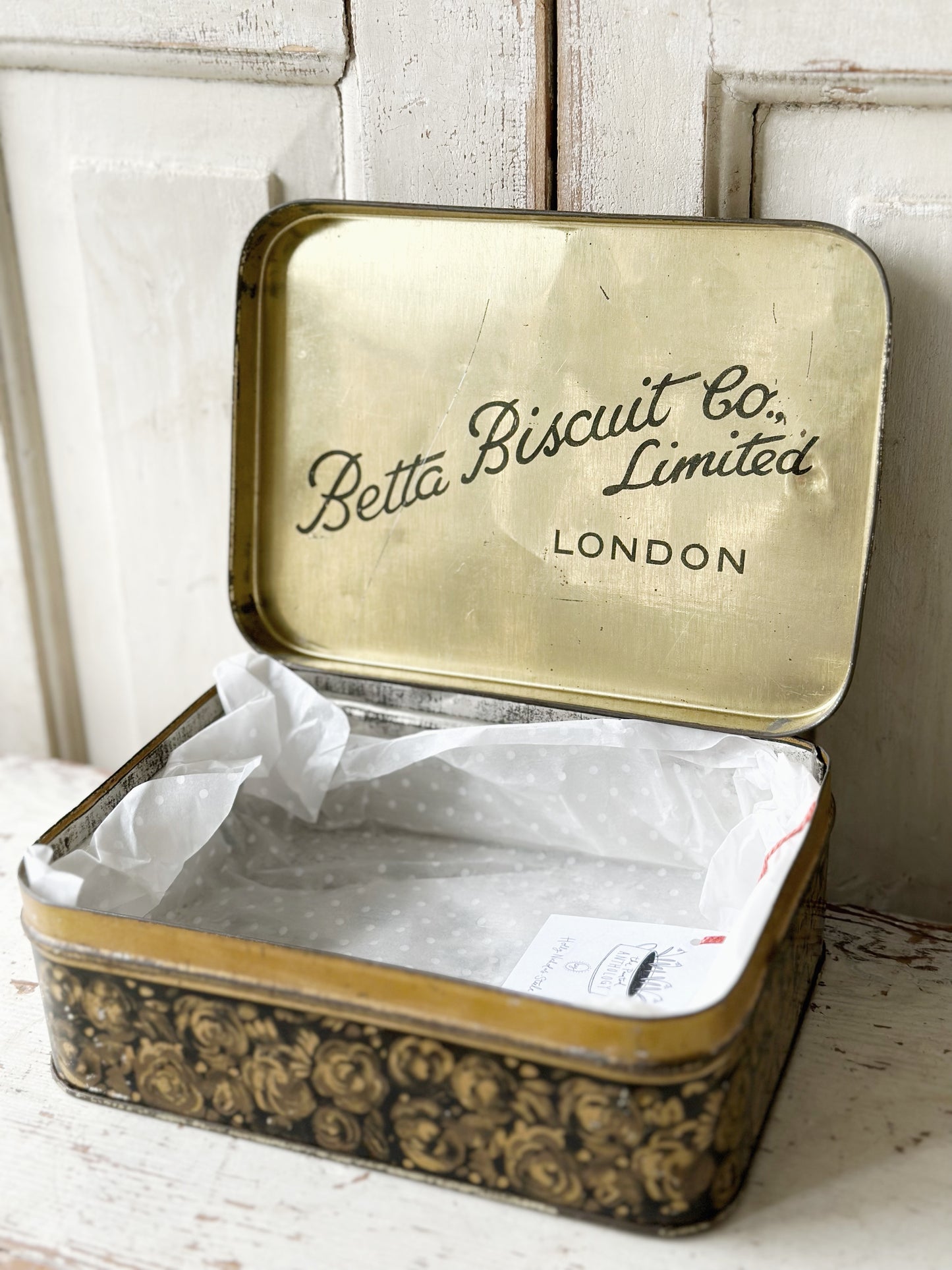 A pretty antique tin with a hand painted quote.